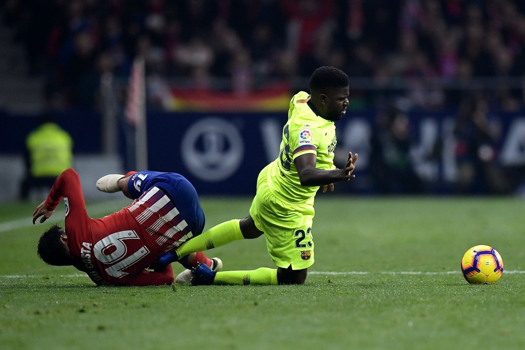 Umtiti and Costa were involved in a heated battle (Photo by OSCAR DEL POZO/AFP/Getty Images)