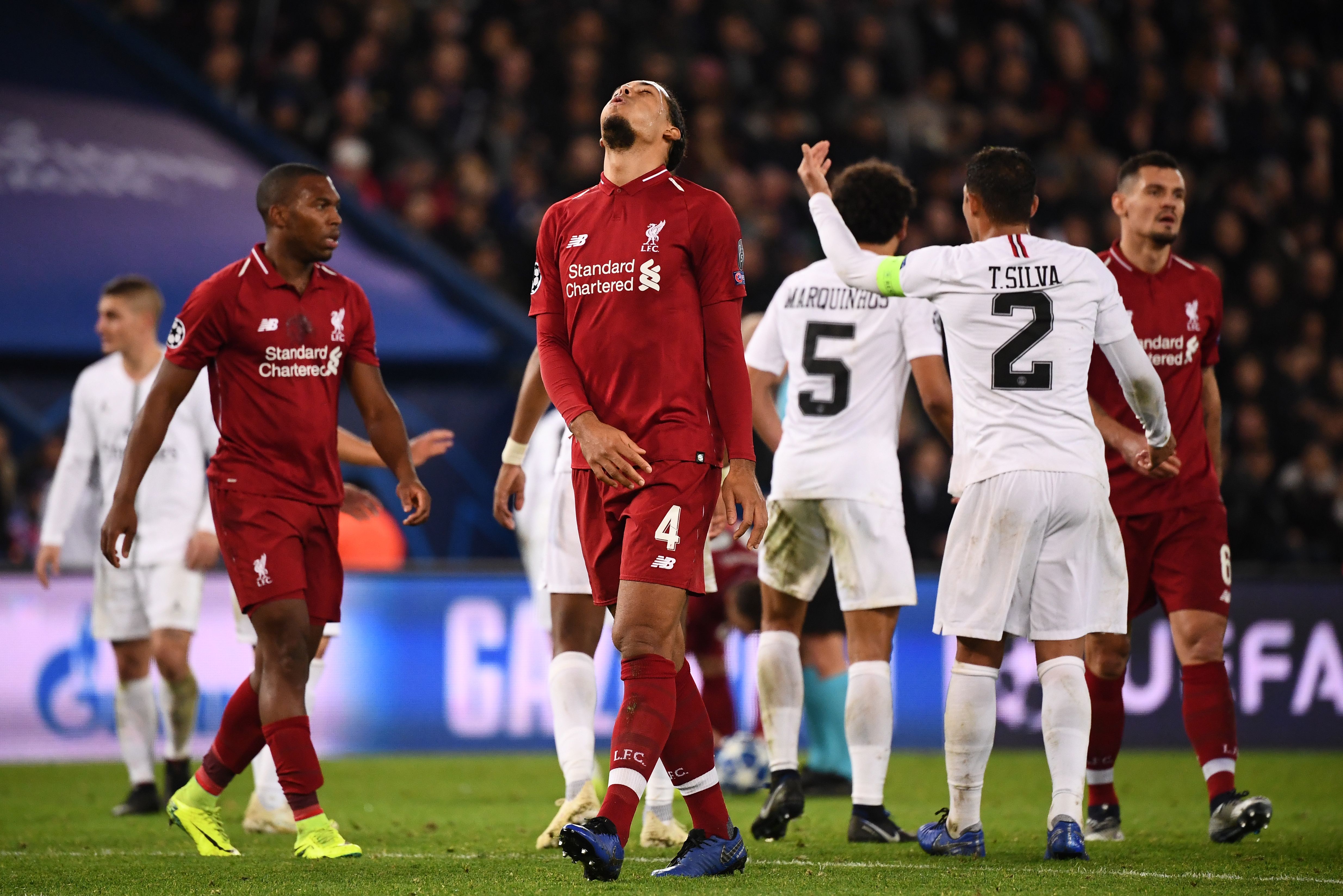 Liverpool's Dutch defender Virgil van Dijk and teammates react during the UEFA Champions League Group C football match between Paris Saint-Germain (PSG) and Liverpool FC at the Parc des Princes stadium, in Paris, on November 28, 2018. (Photo by FRANCK FIFE / AFP) (Photo credit should read FRANCK FIFE/AFP/Getty Images)