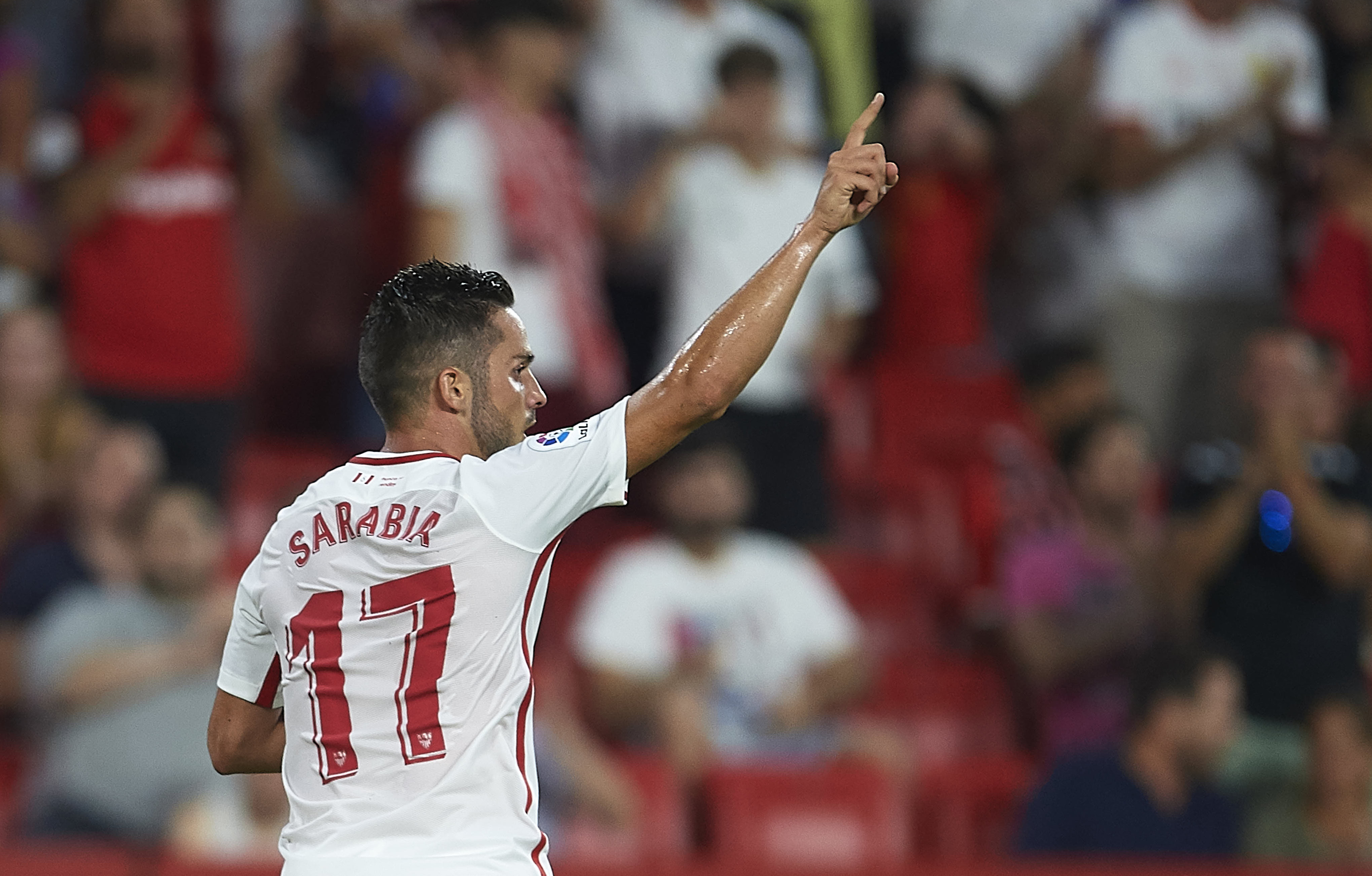 SEVILLE, SPAIN - JULY 26: Pablo Sarabia of Sevilla FC (L) celebrates scoring the third goal of his team during Sevilla v Ujpest UEFA Europa League Second Qualifying Round 1st leg match at Estadio Ramon Sanchez Pizjuan on July 26, 2018 in Seville, Spain. (Photo by Aitor Alcalde/Getty Images)