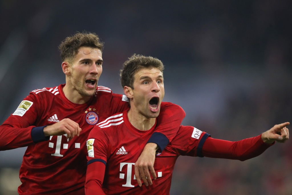 MUNICH, GERMANY - NOVEMBER 24: Thomas Mueller of Bayern Muenchen celebrates scoring the second team goal with his team mate Leon Goretzka during the Bundesliga match between FC Bayern Muenchen and Fortuna Duesseldorf at Allianz Arena on November 24, 2018 in Munich, Germany. (Photo by Alexander Hassenstein/Bongarts/Getty Images)