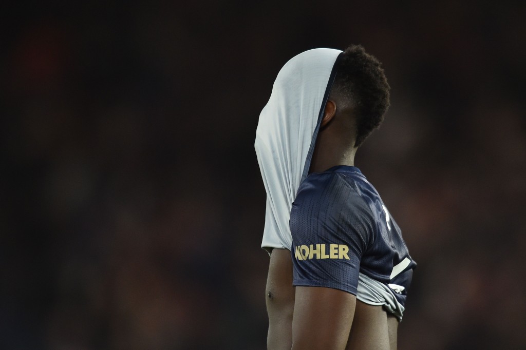 Poor Pogba (Photo by GLYN KIRK/AFP/Getty Images)