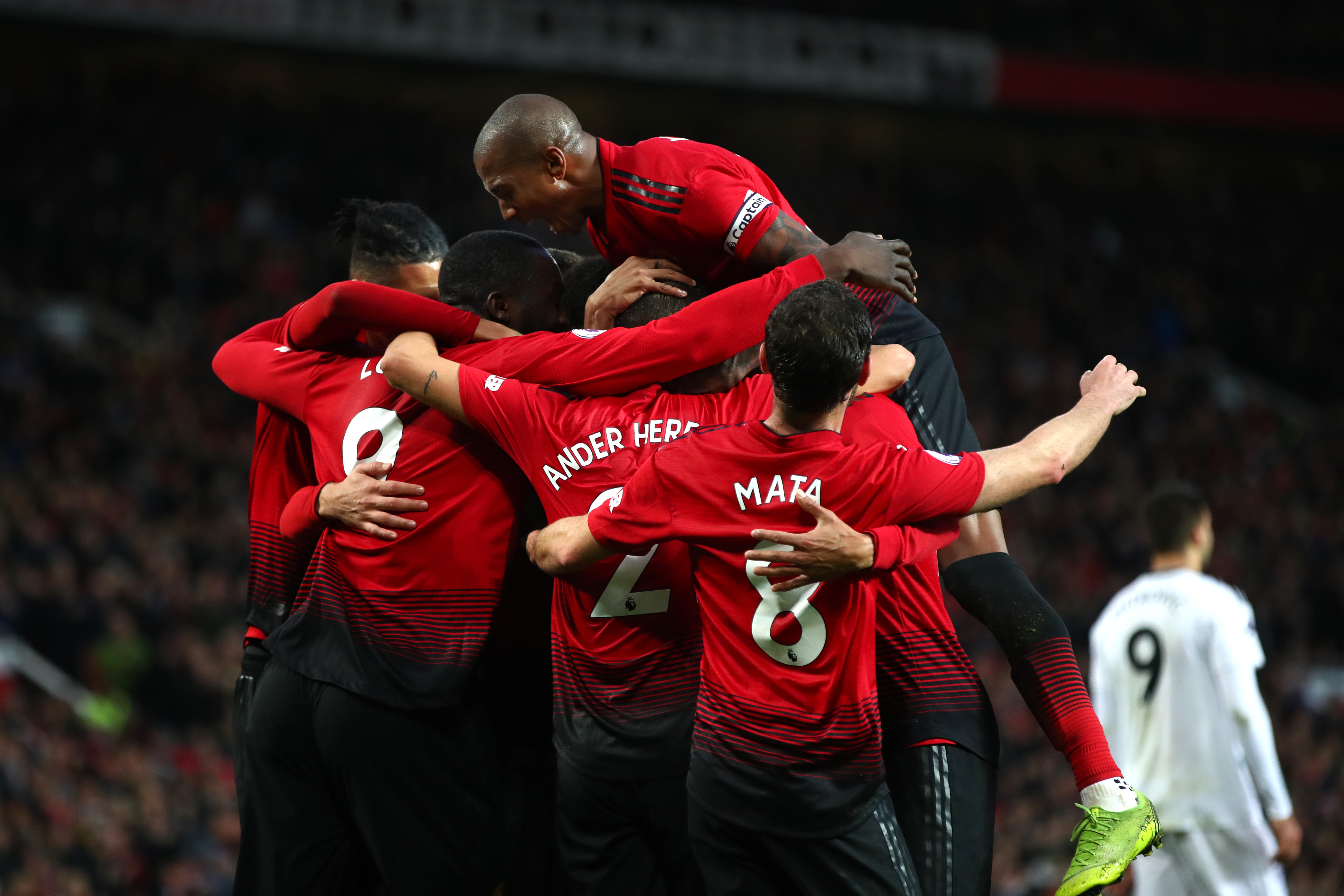 MANCHESTER, ENGLAND - DECEMBER 08: Romelu Lukaku of Manchester United celebrates with teammates after scoring his team's third goal during the Premier League match between Manchester United and Fulham FC at Old Trafford on December 8, 2018 in Manchester, United Kingdom. (Photo by Clive Brunskill/Getty Images)