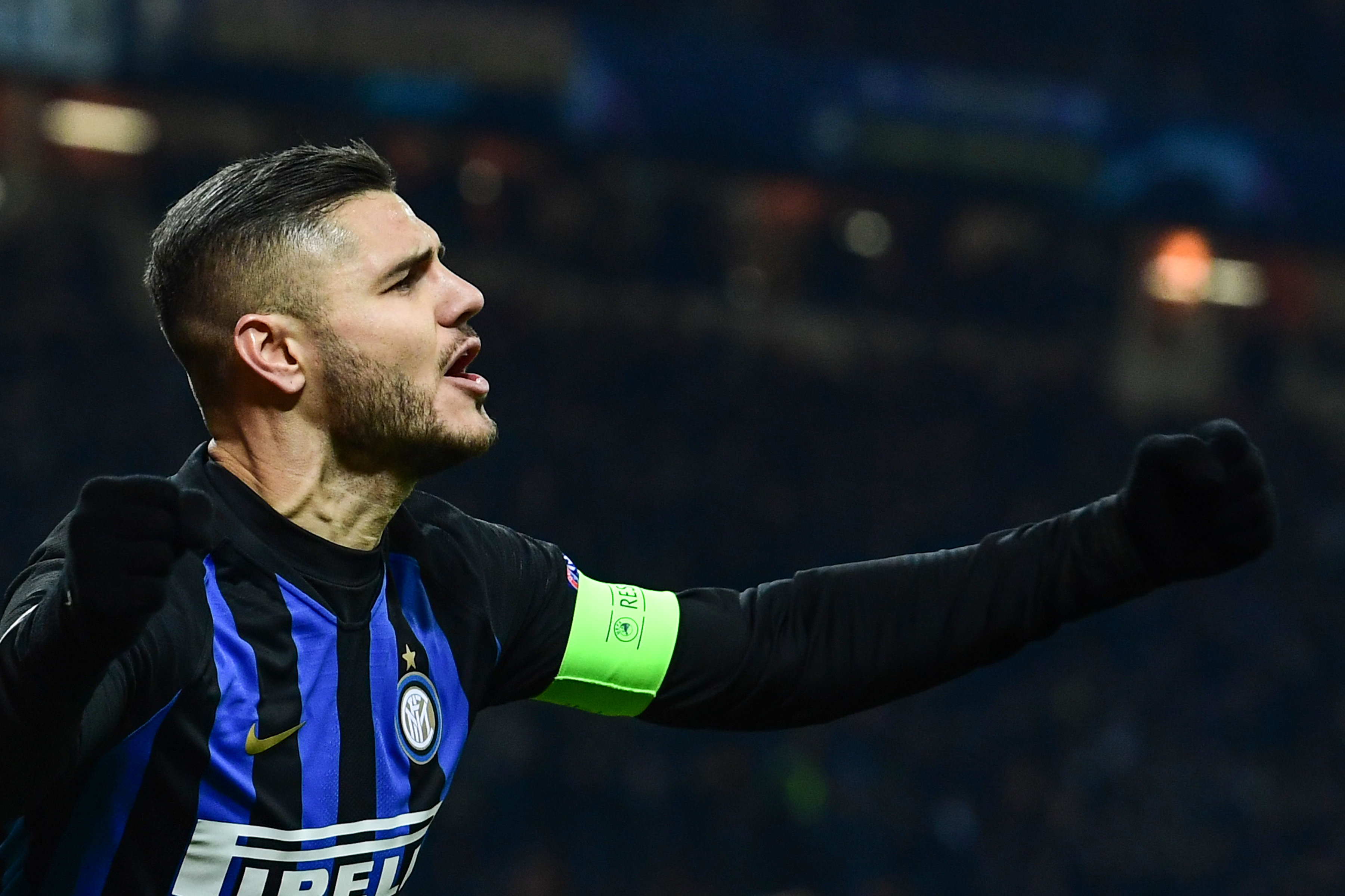 Inter Milan's Argentine forward Mauro Icardi celebrates after scoring an equalizer during the UEFA Champions League group B football match Inter Milan vs PSV Eindhoven on December 11, 2018 at the San Siro stadium in Milan. (Photo by Miguel MEDINA / AFP)        (Photo credit should read MIGUEL MEDINA/AFP/Getty Images)