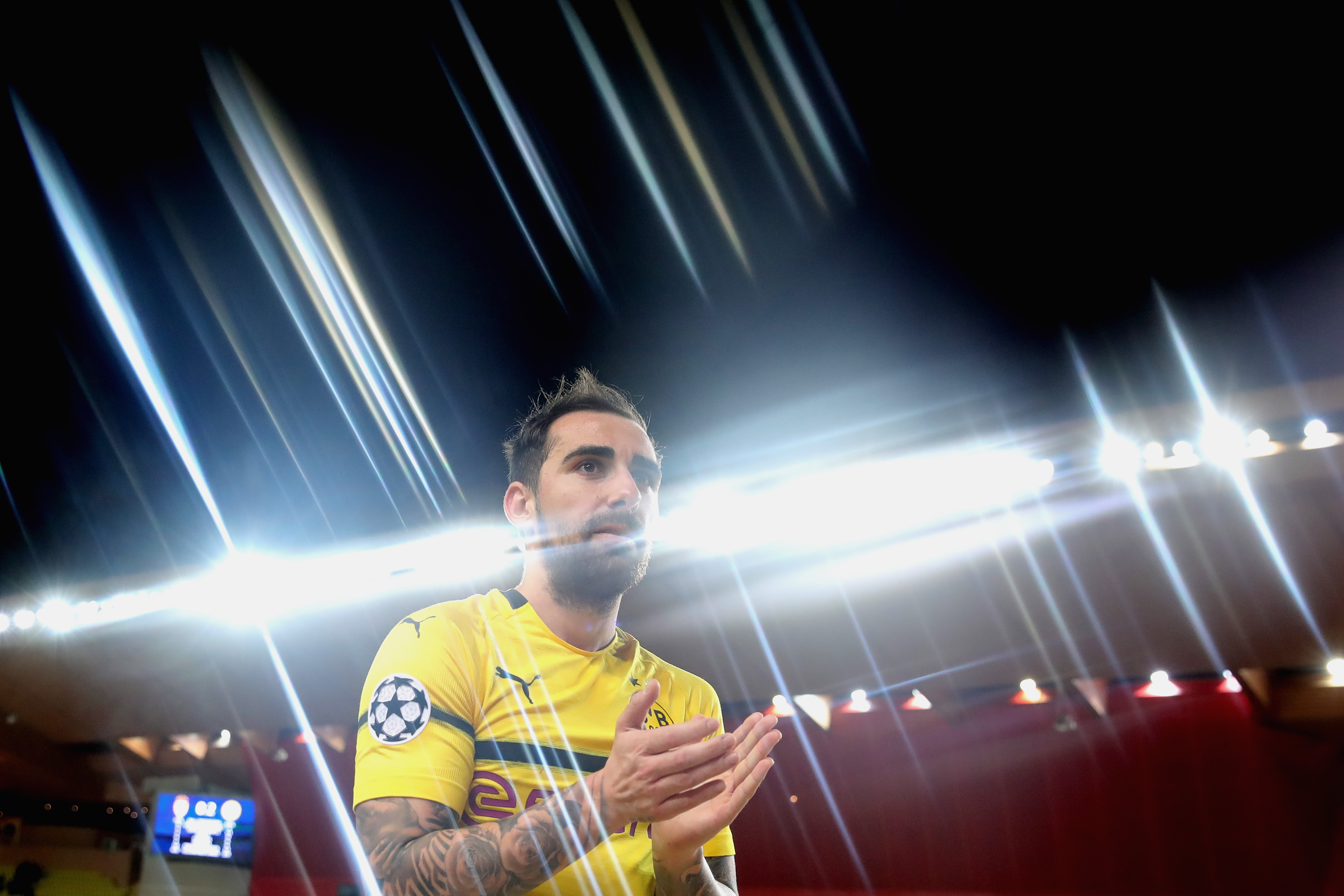 MONACO - DECEMBER 11: (EDITORS NOTE: STAR EFFECT FILTER USED TO CREATE THIS PICTURE!) Paco Alcacer of Dortmund celebrates victory after winning the UEFA Champions League Group A match between AS Monaco and Borussia Dortmund at Stade Louis II on December 11, 2018 in Monaco, Monaco. (Photo by Alexander Hassenstein/Bongarts/Getty Images)