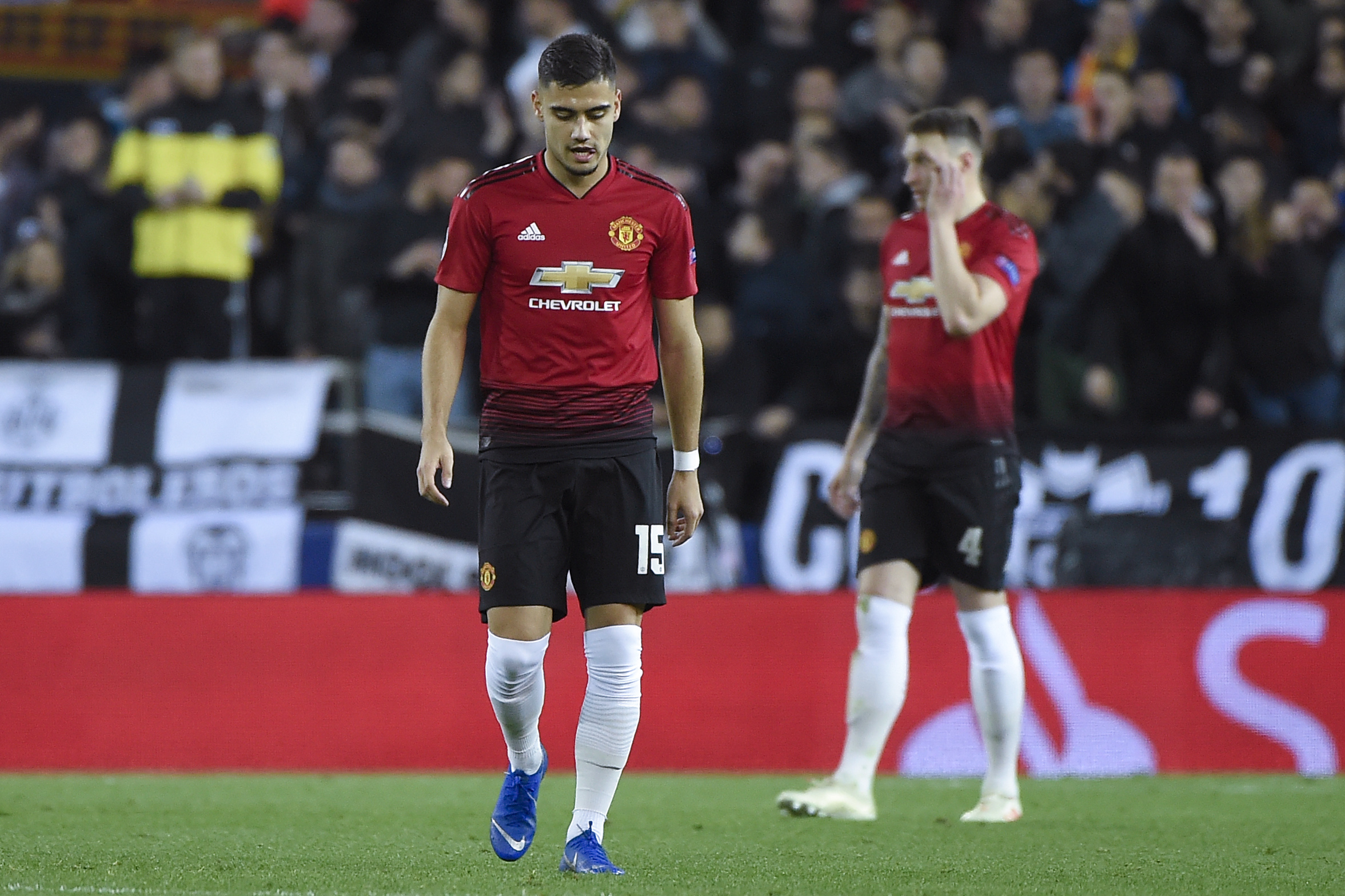Manchester United's Belgian-born Brazilian midfielder Andreas Pereira reacts after Valencia scored a goal during the UEFA Champions League group H football match between Valencia CF and Manchester United at the Mestalla stadium in Valencia on December 12, 2018. (Photo by JOSE JORDAN / AFP)        (Photo credit should read JOSE JORDAN/AFP/Getty Images)