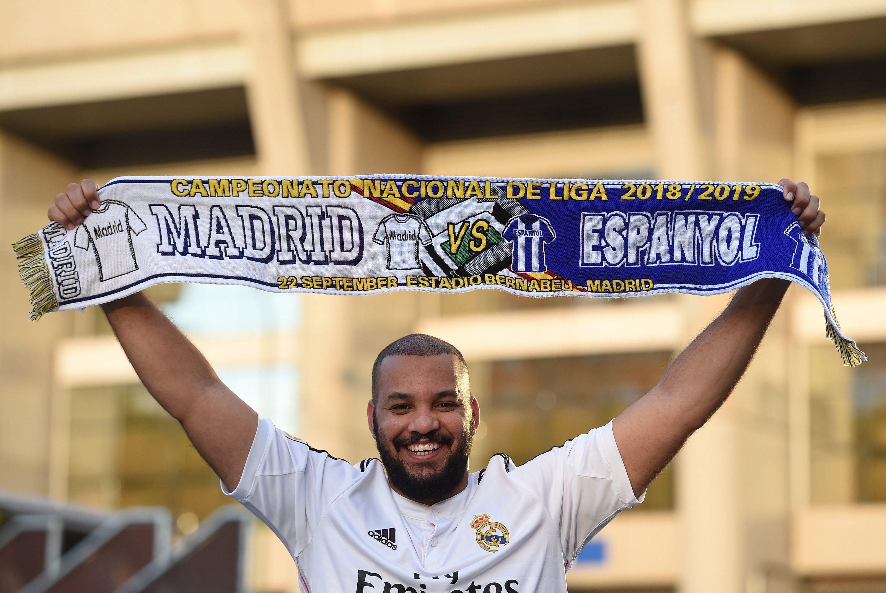 MADRID, SPAIN - SEPTEMBER 22: Obaid of Dubai posing for a photograph holding up the scarf for the Real Madrid v Espanyol La Liga match ahead of the La Liga match between Real Madrid CF and RCD Espanyol at Estadio Santiago Bernabeu on September 22, 2018 in Madrid, Spain. (Photo by Denis Doyle/Getty Images,)