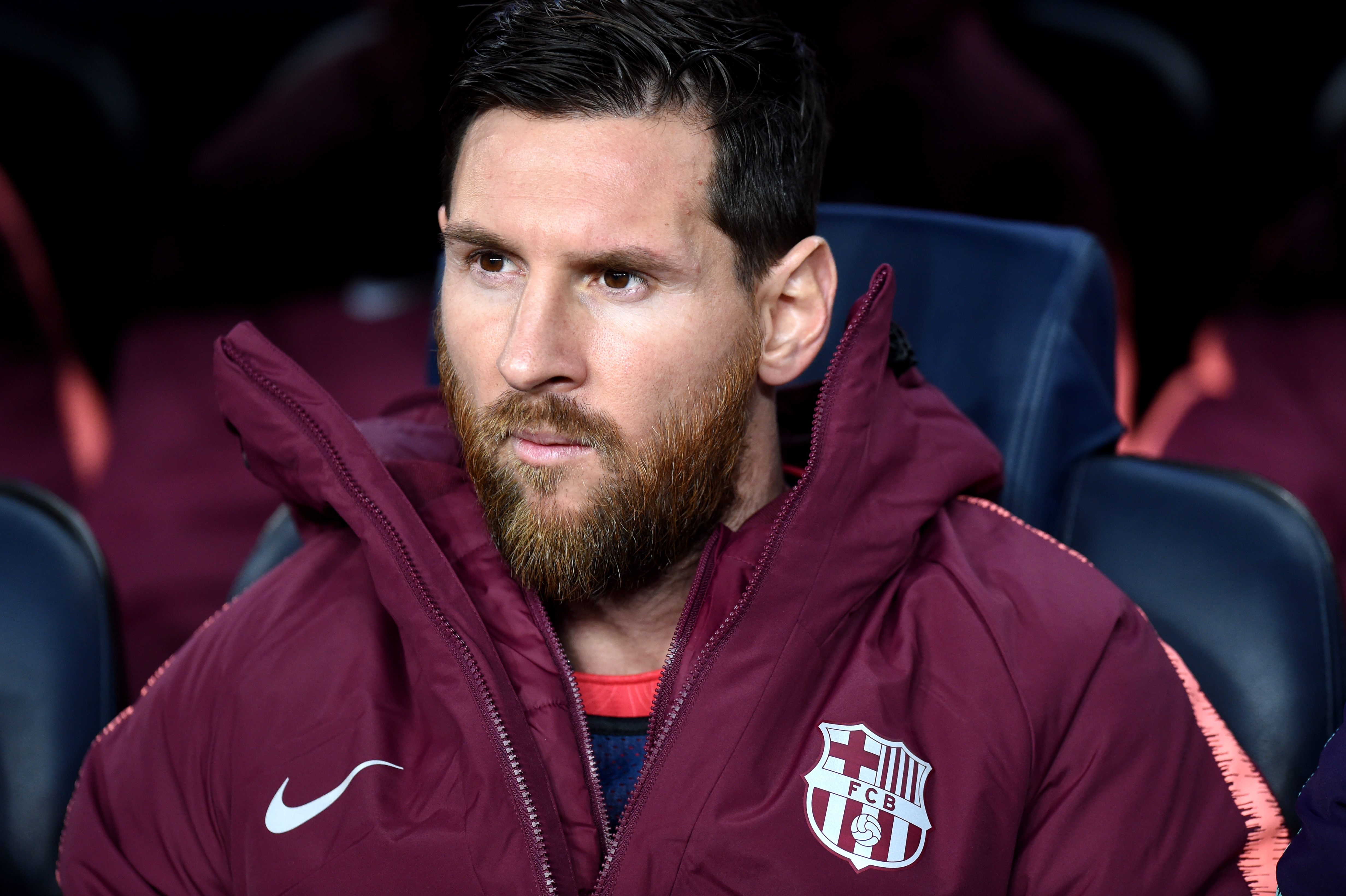 BARCELONA, SPAIN - DECEMBER 11: Lionel Messi of Barcelona sits on the bench prior to the UEFA Champions League Group B match between FC Barcelona and Tottenham Hotspur at Camp Nou on December 11, 2018 in Barcelona, Spain. (Photo by Alex Caparros/Getty Images)