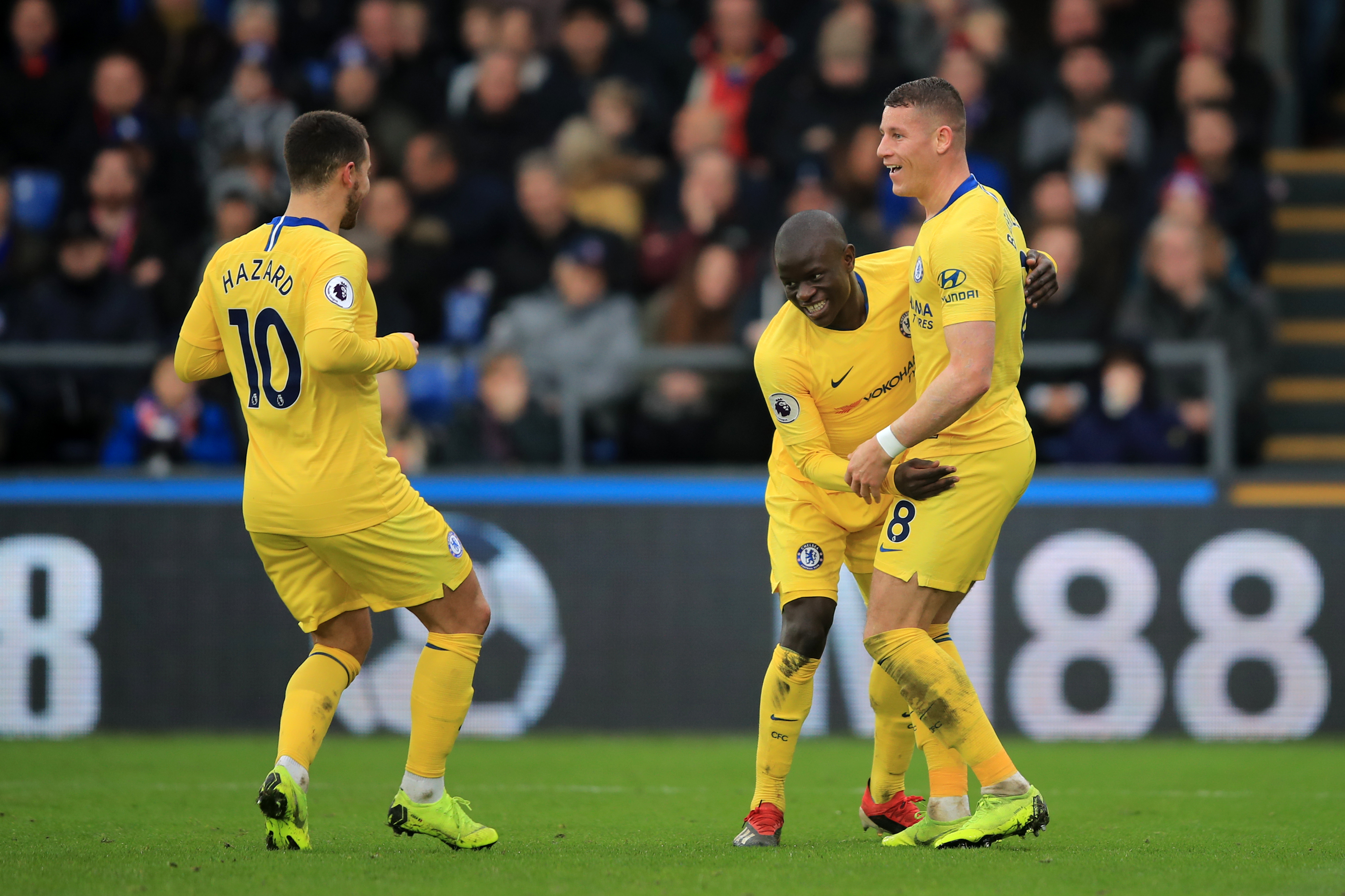 LONDON, ENGLAND - DECEMBER 30: N'Golo Kante of Chelsea celebrates his goal with Ross Barkley and Eden Hazard during the Premier League match between Crystal Palace and Chelsea FC at Selhurst Park on December 30, 2018 in London, United Kingdom. (Photo by Marc Atkins/Getty Images)