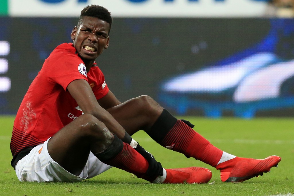 On the receiving end of some bad challenges (Photo by LINDSEY PARNABY/AFP/Getty Images)
