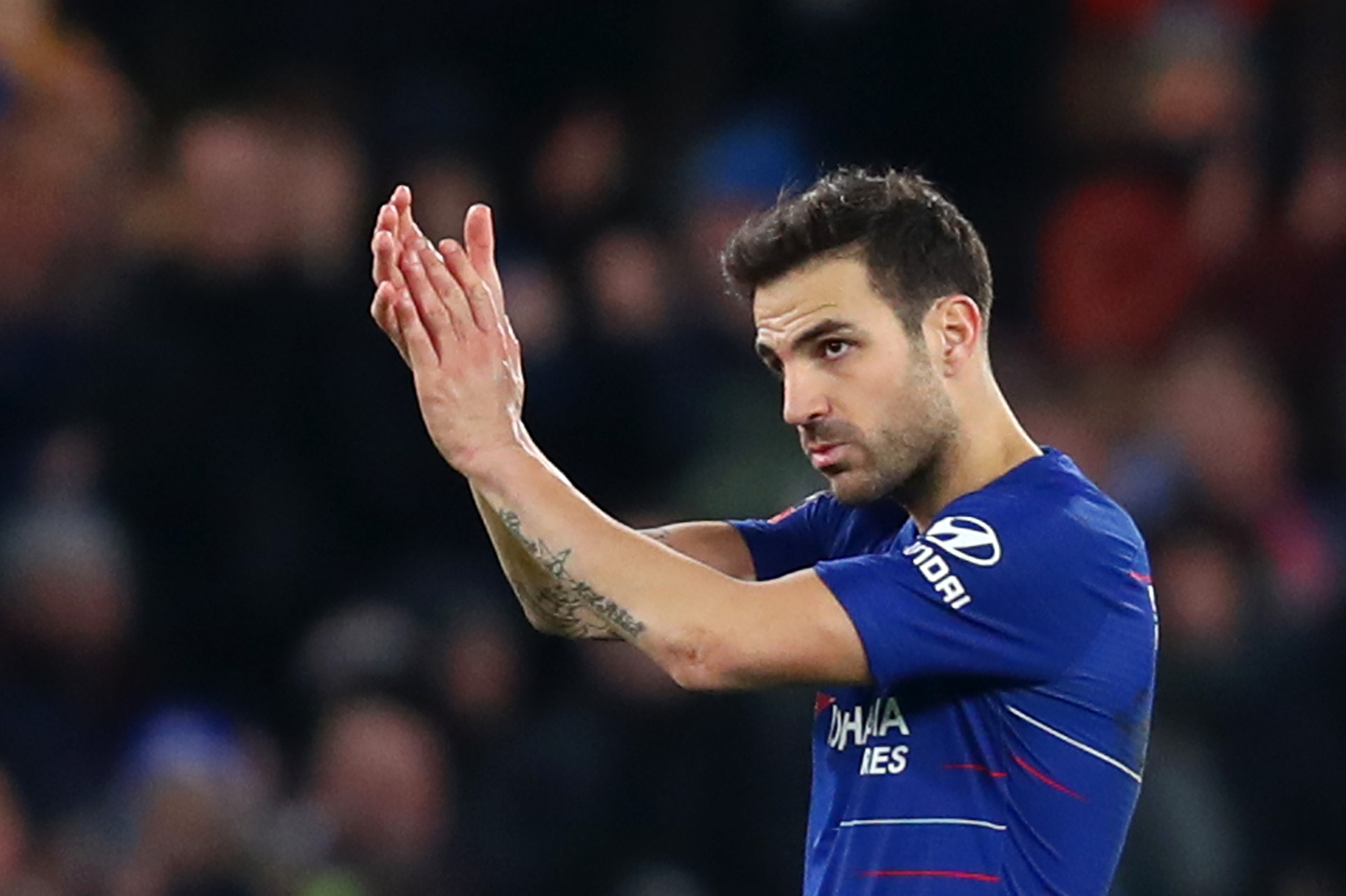 LONDON, ENGLAND - JANUARY 05: Cesc Fabregas of Chelsea applauds the fans during the FA Cup Third Round match between Chelsea and Nottingham Forest at Stamford Bridge on January 5, 2019 in London, United Kingdom. (Photo by Clive Rose/Getty Images)