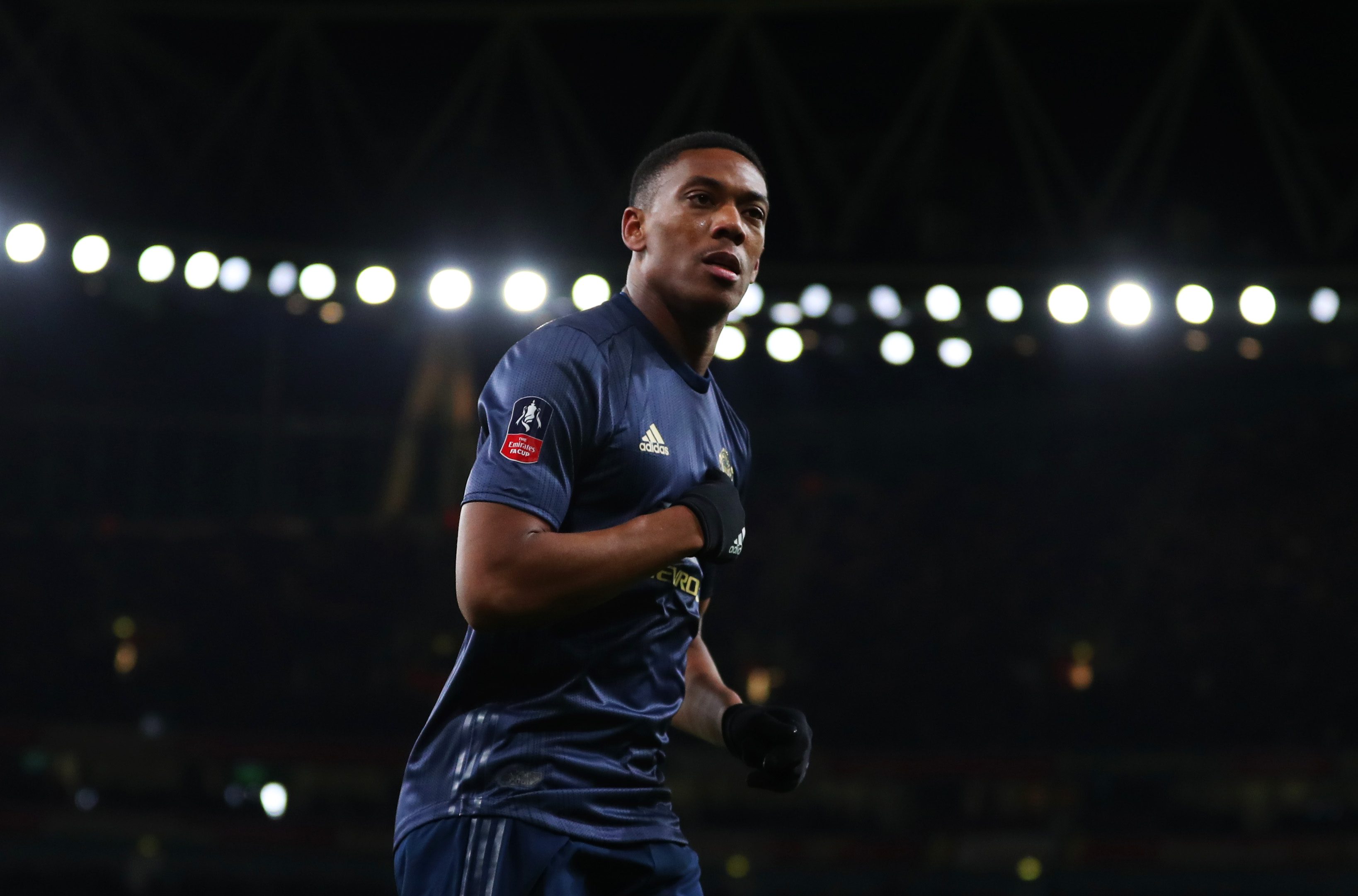 LONDON, ENGLAND - JANUARY 25:  Anthony Martial of Manchester United celebrates after scoring his team's third goal during the FA Cup Fourth Round match between Arsenal and Manchester United at Emirates Stadium on January 25, 2019 in London, United Kingdom. (Photo by Catherine Ivill/Getty Images)