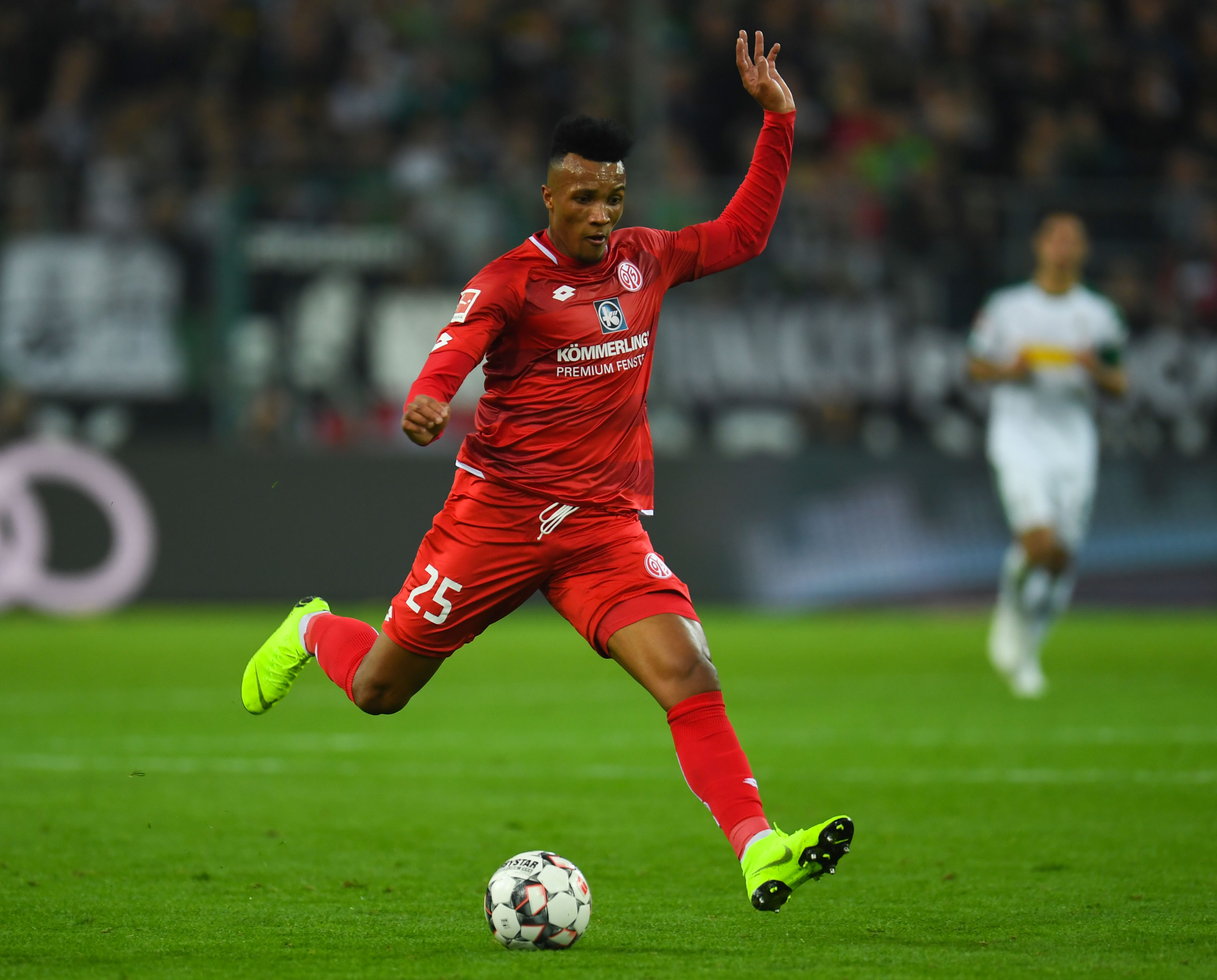 Mainz' Ivorian midfielder Jean Philippe Gbamin plays the ball during the German first division Bundesliga football match Borussia Moenchengladbach v 1 FSV Mainz 05 in Moenchengladbach, western Germany on October 21, 2018. (Photo by Patrik STOLLARZ / AFP) / RESTRICTIONS: DFL REGULATIONS PROHIBIT ANY USE OF PHOTOGRAPHS AS IMAGE SEQUENCES AND/OR QUASI-VIDEO (Photo credit should read PATRIK STOLLARZ/AFP/Getty Images)