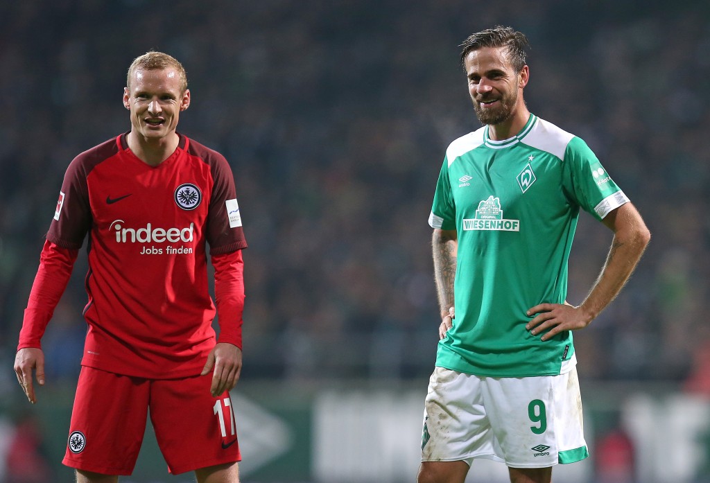 BREMEN, GERMANY - JANUARY 26: (L-R) Sebastian Rode of Eintracht Frankfurt and Martin Harnik of Werder Bremen talk to each other during the Bundesliga match between SV Werder Bremen and Eintracht Frankfurt at Weserstadion on January 26, 2019 in Bremen, Germany. (Photo by Cathrin Mueller/Bongarts/Getty Images)