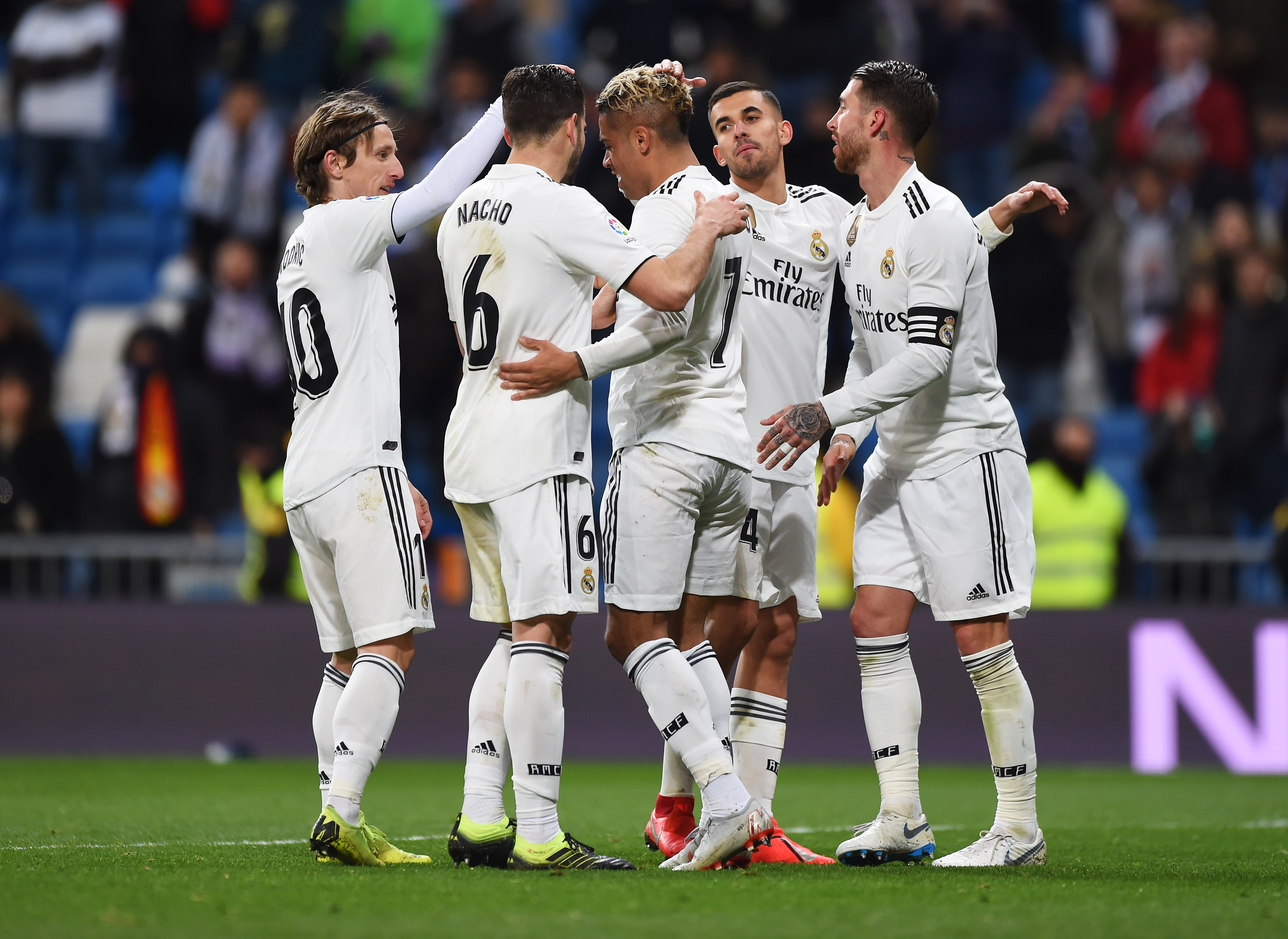 MADRID, SPAIN - FEBRUARY 03:  Mariano of Real Madrid (7) celebrates after scoring his team's third goal with team mates during the La Liga match between Real Madrid CF and Deportivo Alaves at Estadio Santiago Bernabeu on February 03, 2019 in Madrid, Spain. (Photo by Denis Doyle/Getty Images)