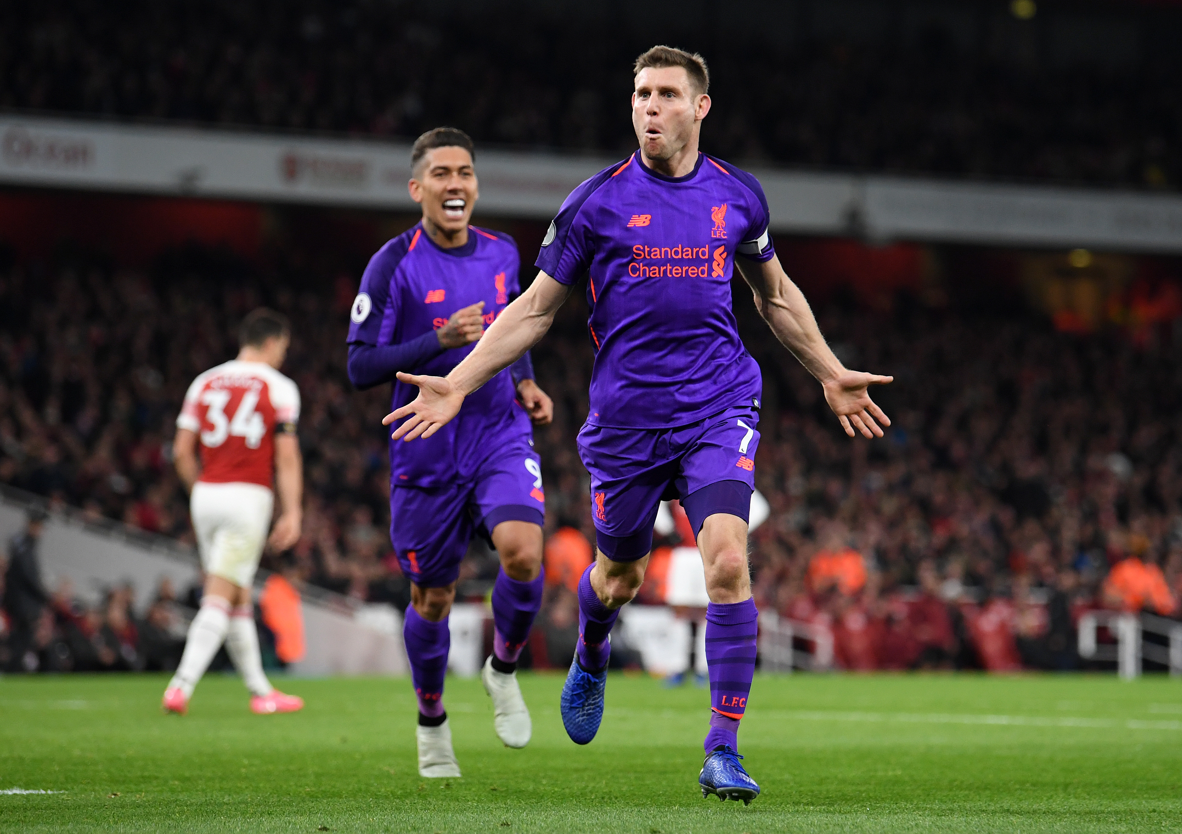 LONDON, ENGLAND - NOVEMBER 03: James Milner of Liverpool celebrates after he scores his sides first goal during the Premier League match between Arsenal FC and Liverpool FC at Emirates Stadium on November 3, 2018 in London, United Kingdom. (Photo by Michael Regan/Getty Images)