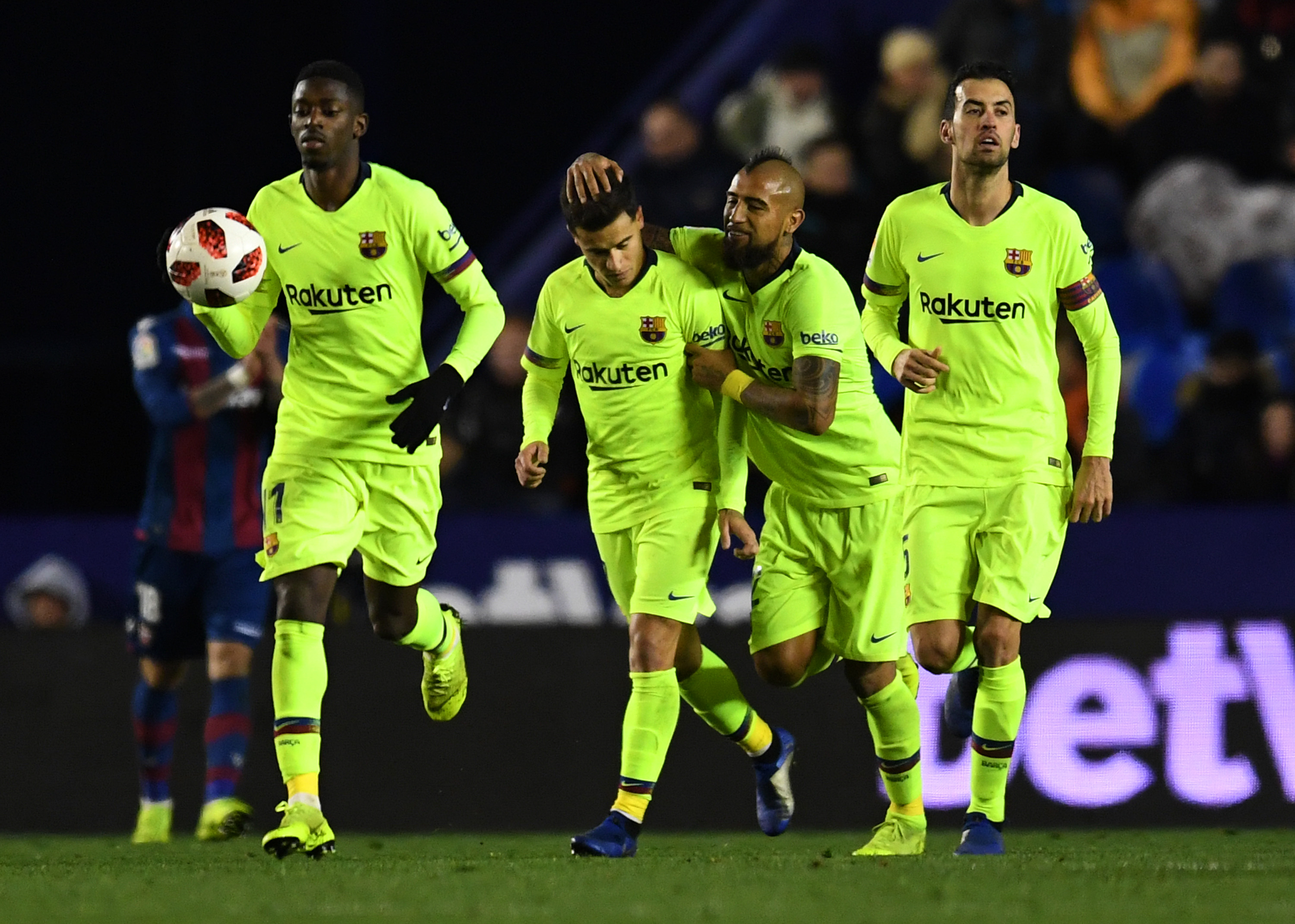 VALENCIA, SPAIN - JANUARY 10: Philippe Coutinho of Barcelona (2L) celebrates after scoring his team's first goal with Ousmane Dembele (L), Arturo Vidal (2R) and Sergio Busquets (R) during the Copa del Rey Round of 16 match between Levante and FC Barcelona at Ciutat de Valencia on January 10, 2019 in Valencia, Spain. (Photo by David Ramos/Getty Images)