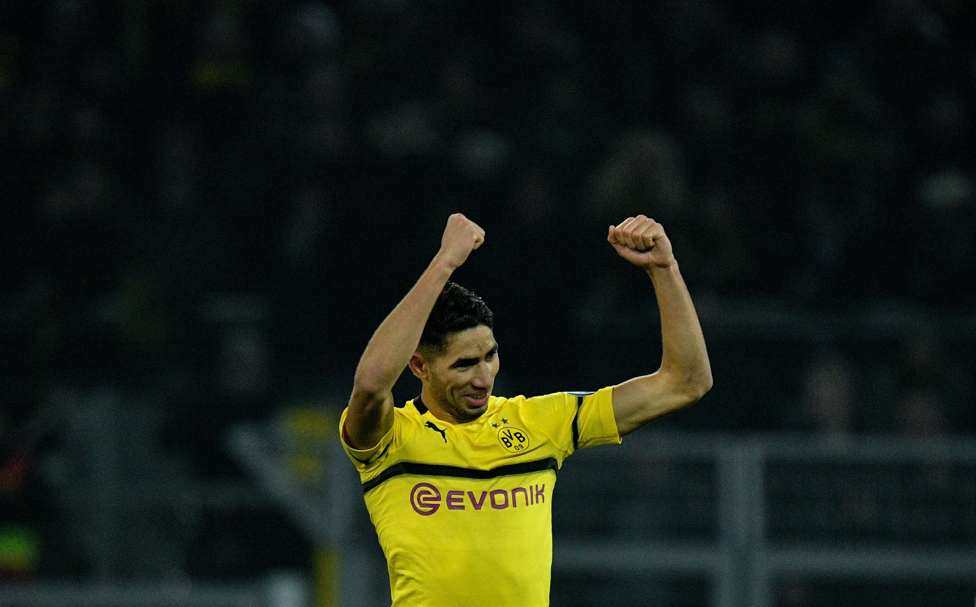 Dortmund's defender Achraf Hakimi celebrates scoring the 3-2 goal during the German Cup (DFB Pokal) last 16 football match BVB Borussia Dortmund v Werder Bremen in Dortmund, western Germany on February 5, 2019. (Photo by SASCHA SCHUERMANN / AFP) / DFB REGULATIONS PROHIBIT ANY USE OF PHOTOGRAPHS AS IMAGE SEQUENCES AND QUASI-VIDEO. (Photo credit should read SASCHA SCHUERMANN/AFP/Getty Images)