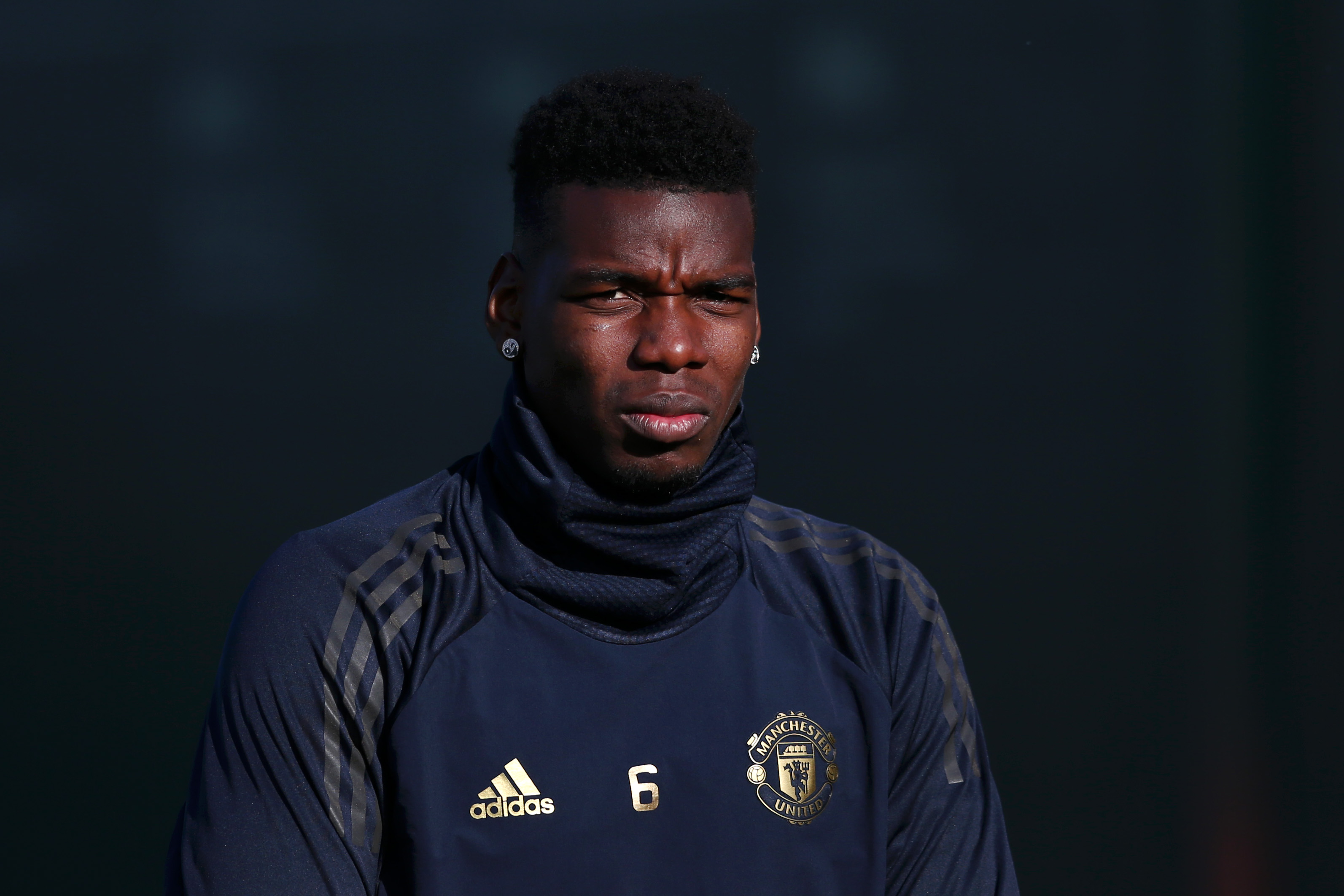 MANCHESTER, ENGLAND - FEBRUARY 11: Paul Pogba of Manchester United arrives for a training session ahead of their UEFA Champions League Round of 16 match against Paris Saint-Germain F.C. at Aon Training Complex on February 11, 2019 in Manchester, England. (Photo by Jan Kruger/Getty Images)