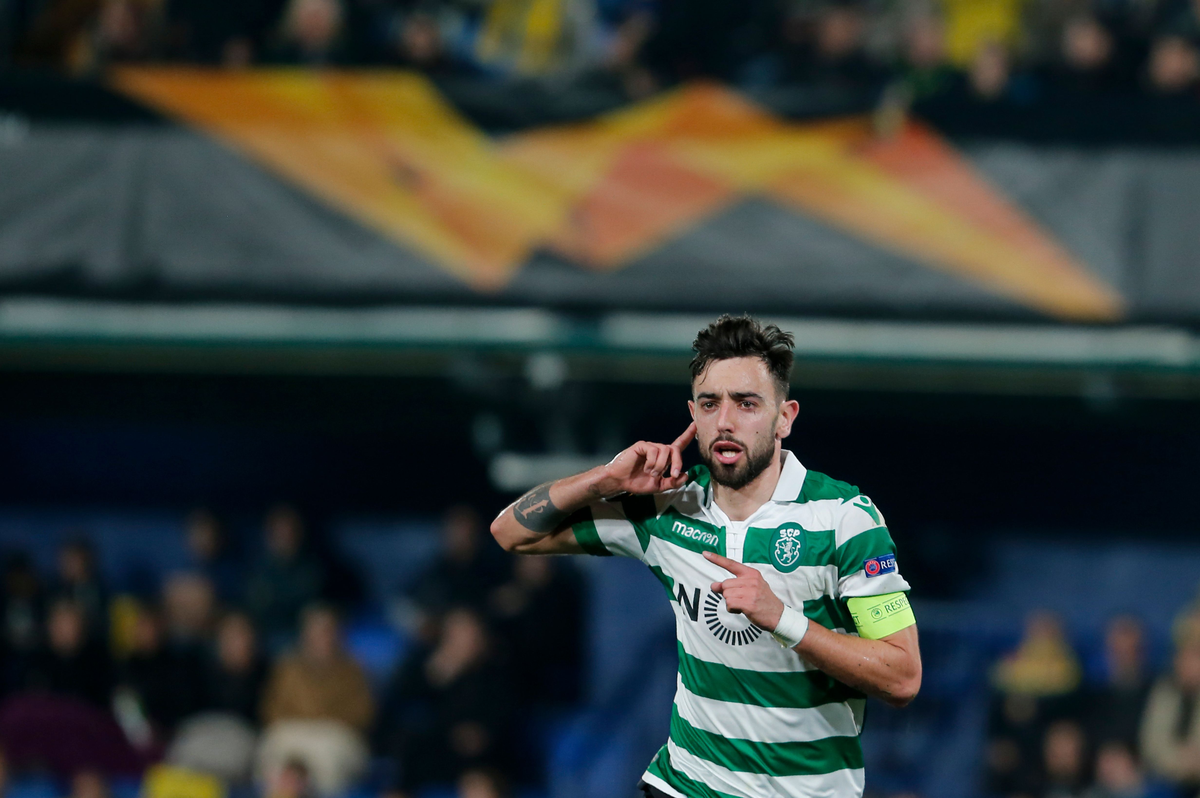 Sporting's Portuguese midfielder Bruno Fernandes celebrates after scoring during the UEFA Europa League round of 32 second leg football match between Villarreal CF and Sporting CP at the Ceramica stadium in Villarreal on February 21, 2019. (Photo by PAU BARRENA / AFP) (Photo credit should read PAU BARRENA/AFP/Getty Images)
