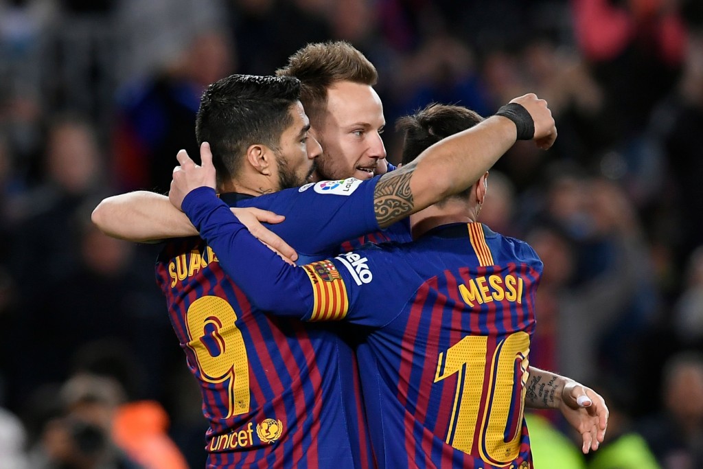 Messi, Suarez on target for Barcelona (Photo by LLUIS GENE/AFP/Getty Images)