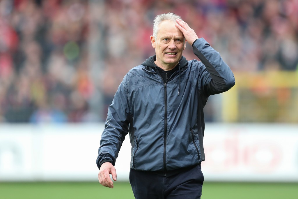 FREIBURG IM BREISGAU, GERMANY - MARCH 09: Head coach Christian Streich of SC Freiburg reacts during the Bundesliga match between Sport-Club Freiburg and Hertha BSC at Schwarzwald-Stadion on March 9, 2019 in Freiburg im Breisgau, Germany. (Photo by Christian Kaspar-Bartke/Bongarts/Getty Images)