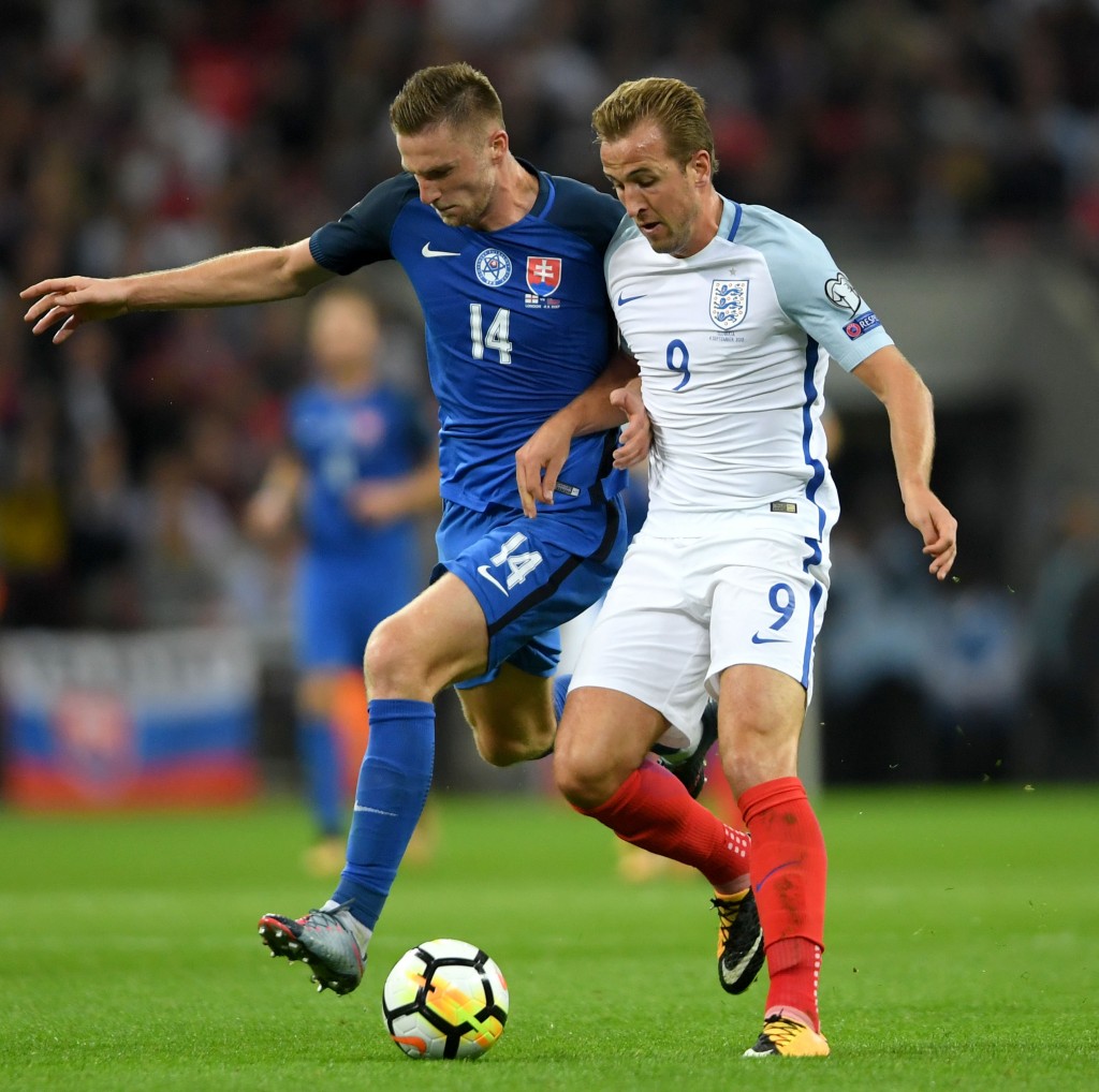 LONDON, ENGLAND - SEPTEMBER 04: Harry Kane of England holds off Milan Skriniar of Slovakia during the FIFA 2018 World Cup Qualifier between England and Slovakia at Wembley Stadium on September 4, 2017 in London, England. (Photo by Mike Hewitt/Getty Images)