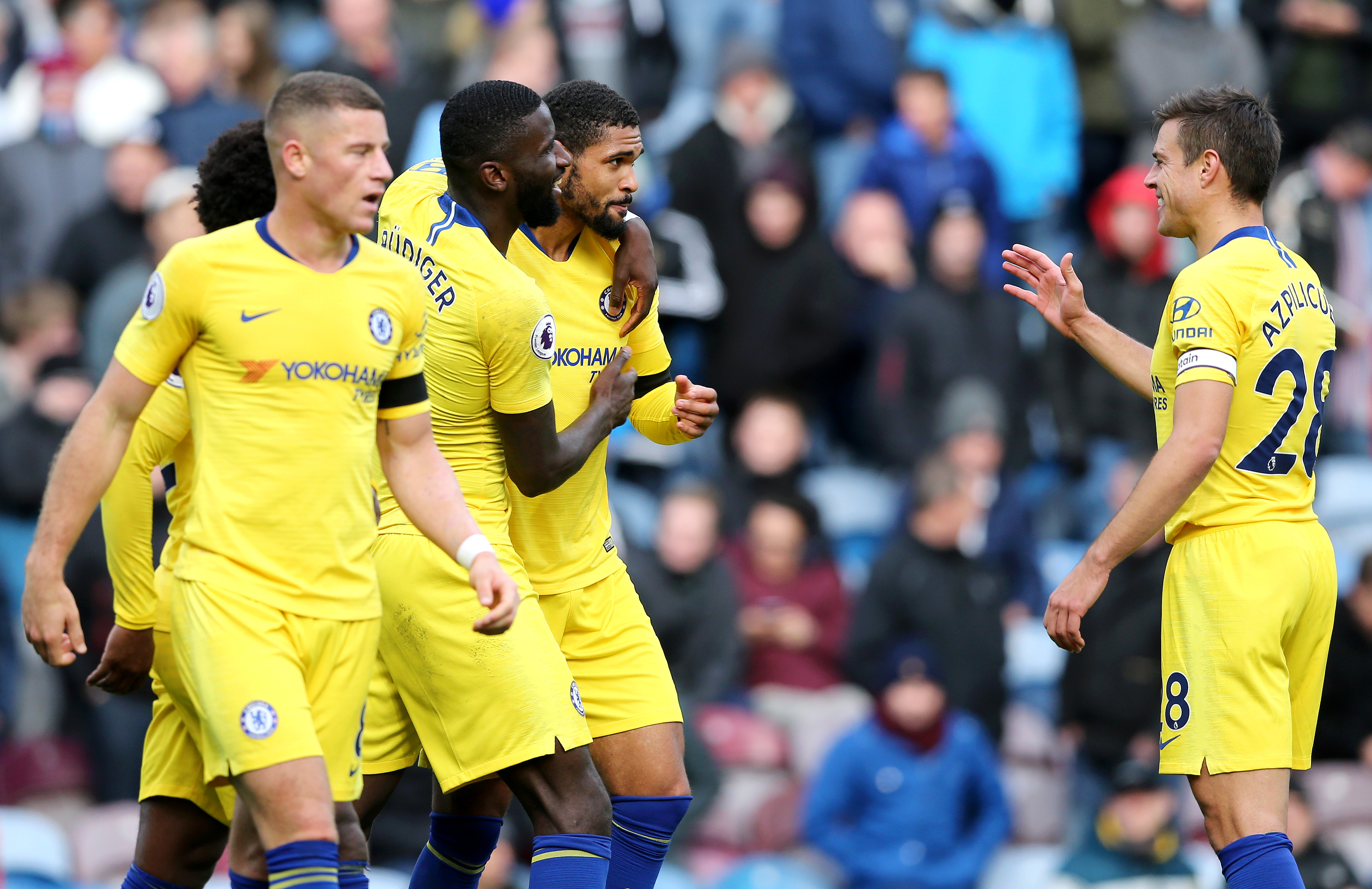 BURNLEY, ENGLAND - OCTOBER 28: Ruben Loftus-Cheek of Chelsea celebrates with teammates Ross Barkley, Antonio Ruediger and Cesar Azpilicueta after scoring his sides fourth goal during the Premier League match between Burnley FC and Chelsea FC at Turf Moor on October 28, 2018 in Burnley, United Kingdom. (Photo by Nigel Roddis/Getty Images)