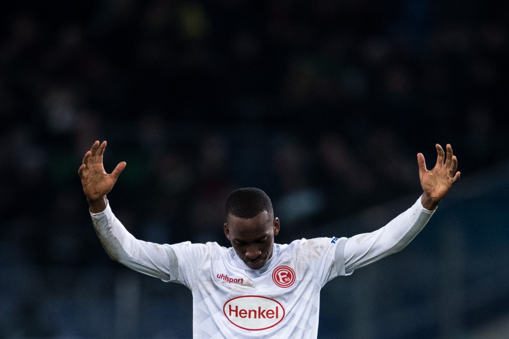 HANOVER, GERMANY - DECEMBER 22: Dodi Lukebakio of Düsseldorf celebrates the win of the Bundesliga match between Hannover 96 and Fortuna Duesseldorf at HDI-Arena on December 22, 2018 in Hanover, Germany. (Photo by Lukas Schulze/Bongarts/Getty Images)