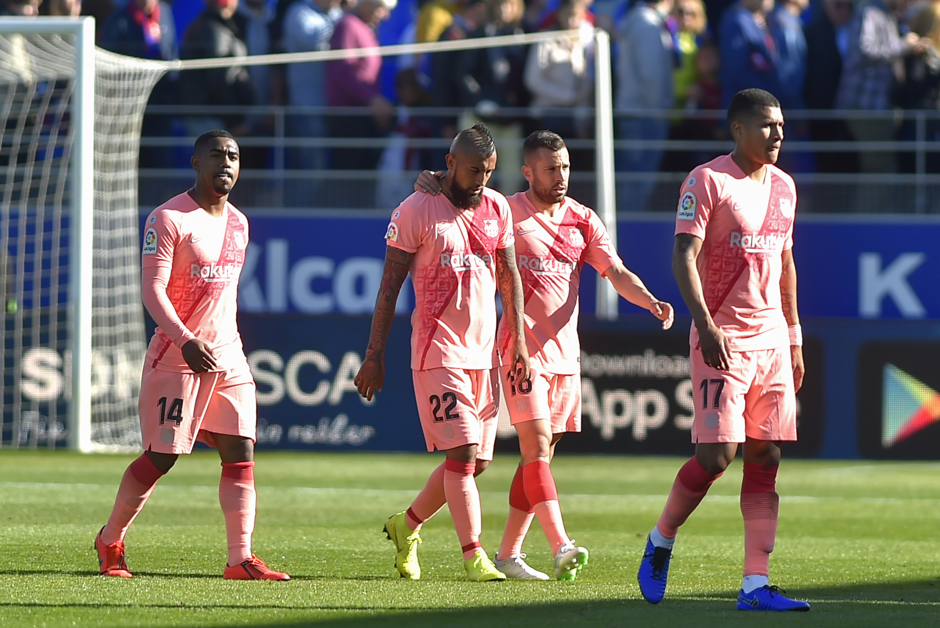 (FromL) Barcelona's Brazilian midfielder Malcom, Barcelona's Chilean midfielder Arturo Vidal, Barcelona's Spanish defender Jordi Alba and Barcelona's Colombian defender Jeison Murillo leave the pitch after the Spanish league football match between SD Huesca and FC Barcelona at the El Alcoraz stadium in Huesca on April 13, 2019. (Photo by ANDER GILLENEA / AFP) (Photo credit should read ANDER GILLENEA/AFP/Getty Images)