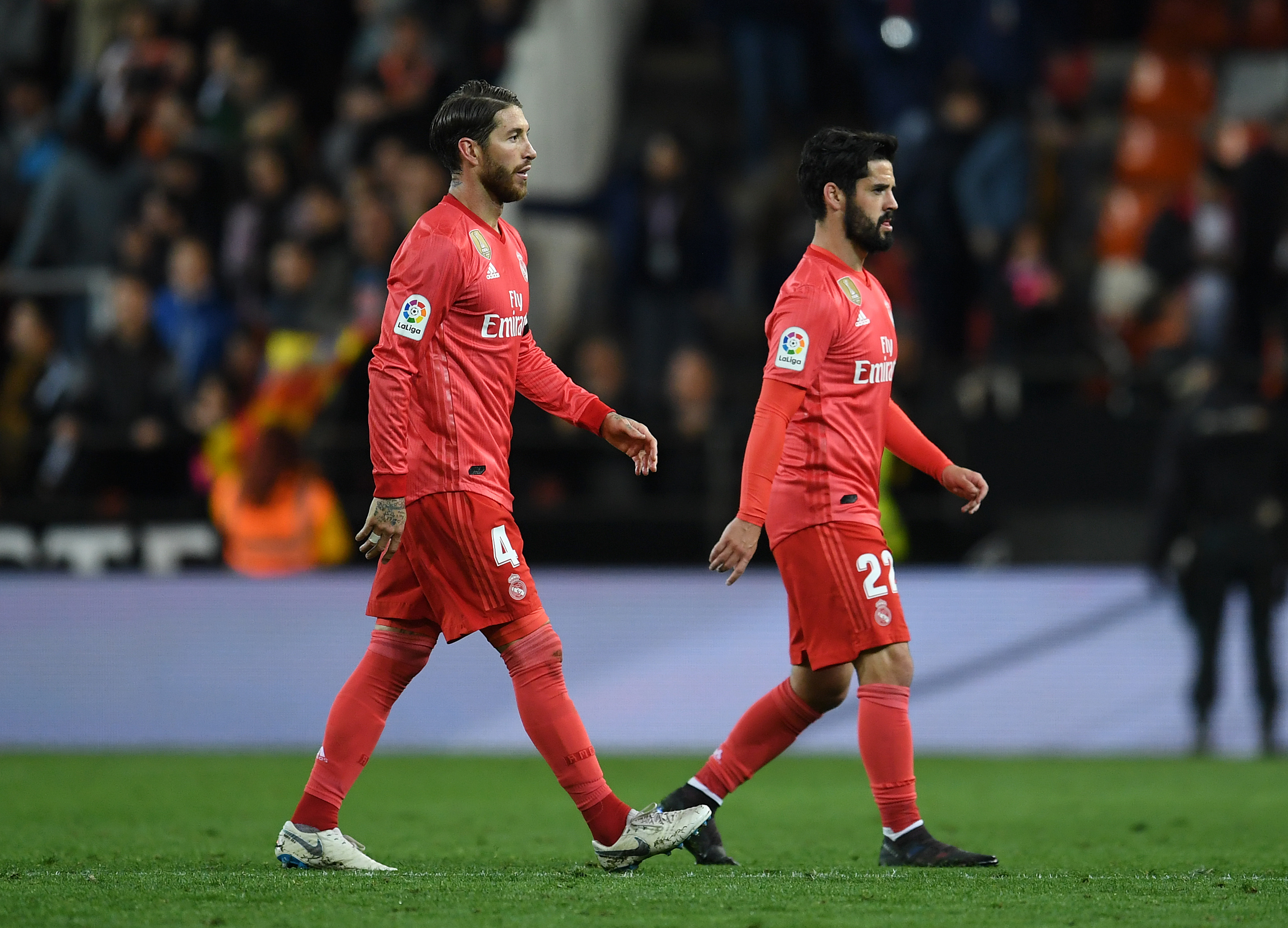 VALENCIA, SPAIN - APRIL 03:  Sergio Ramos of Real Madrid (L) and Isco of Real Madrid leave the field pitch dejected following their side's defeat during the La Liga match between Valencia CF and Real Madrid CF at Estadio Mestalla on April 03, 2019 in Valencia, Spain. (Photo by David Ramos/Getty Images)