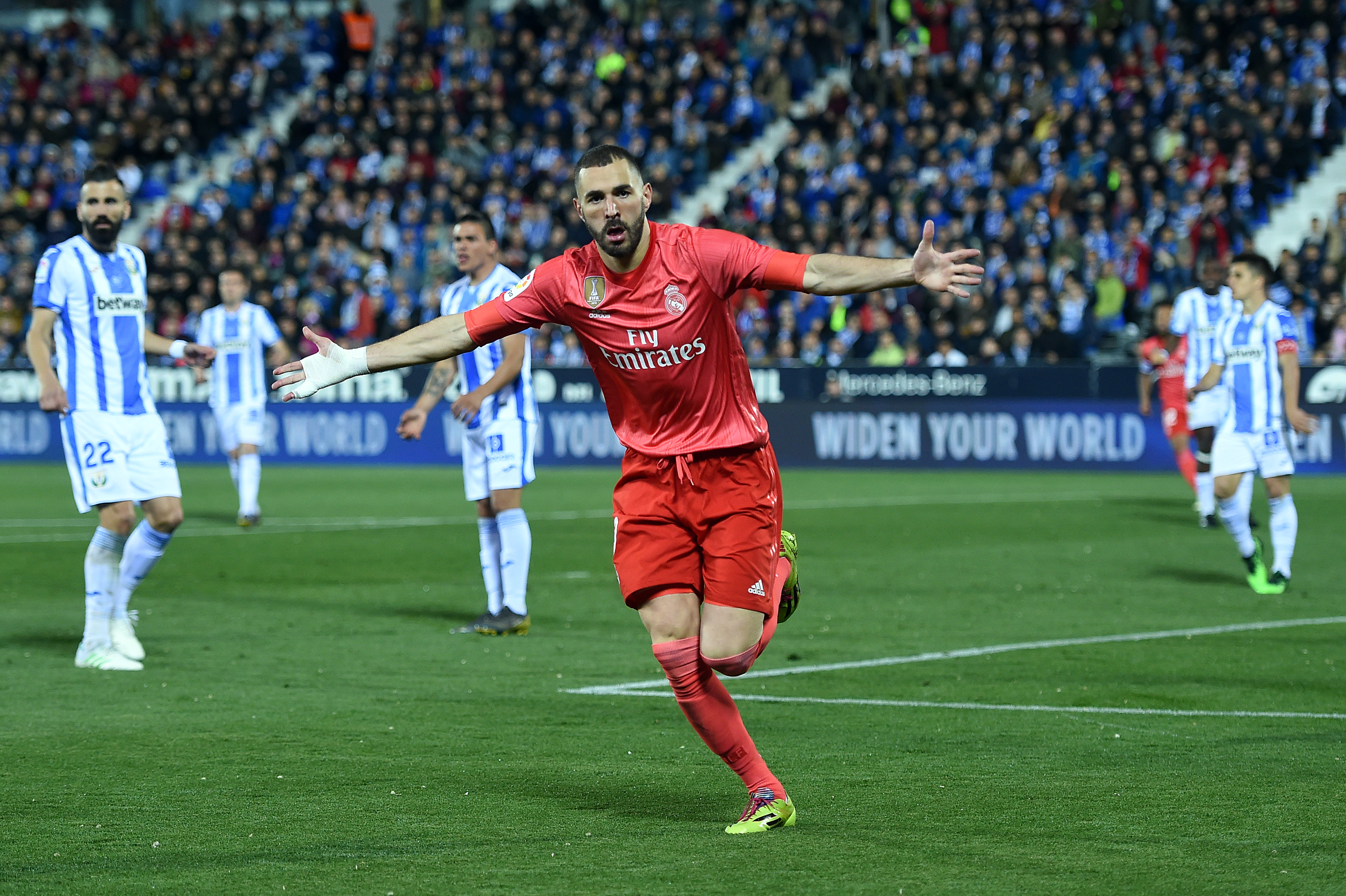 LEGANES, SPAIN - APRIL 15: Karim Benzema of Real Madrid celebrates scoring their first goal during the La Liga match between CD Leganes and Real Madrid CF at Estadio Municipal de Butarque on April 15, 2019 in Leganes, Spain. (Photo by Denis Doyle/Getty Images)