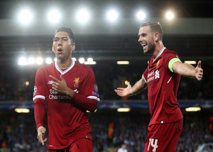 LIVERPOOL, ENGLAND - AUGUST 23:  Roberto Firmino of Liverpool celebrates scoring his sides fourth goal with Jordan Henderson of Liverpool during the UEFA Champions League Qualifying Play-Offs round second leg match between Liverpool FC and 1899 Hoffenheim at Anfield on August 23, 2017 in Liverpool, United Kingdom.  (Photo by Mark Robinson/Getty Images)