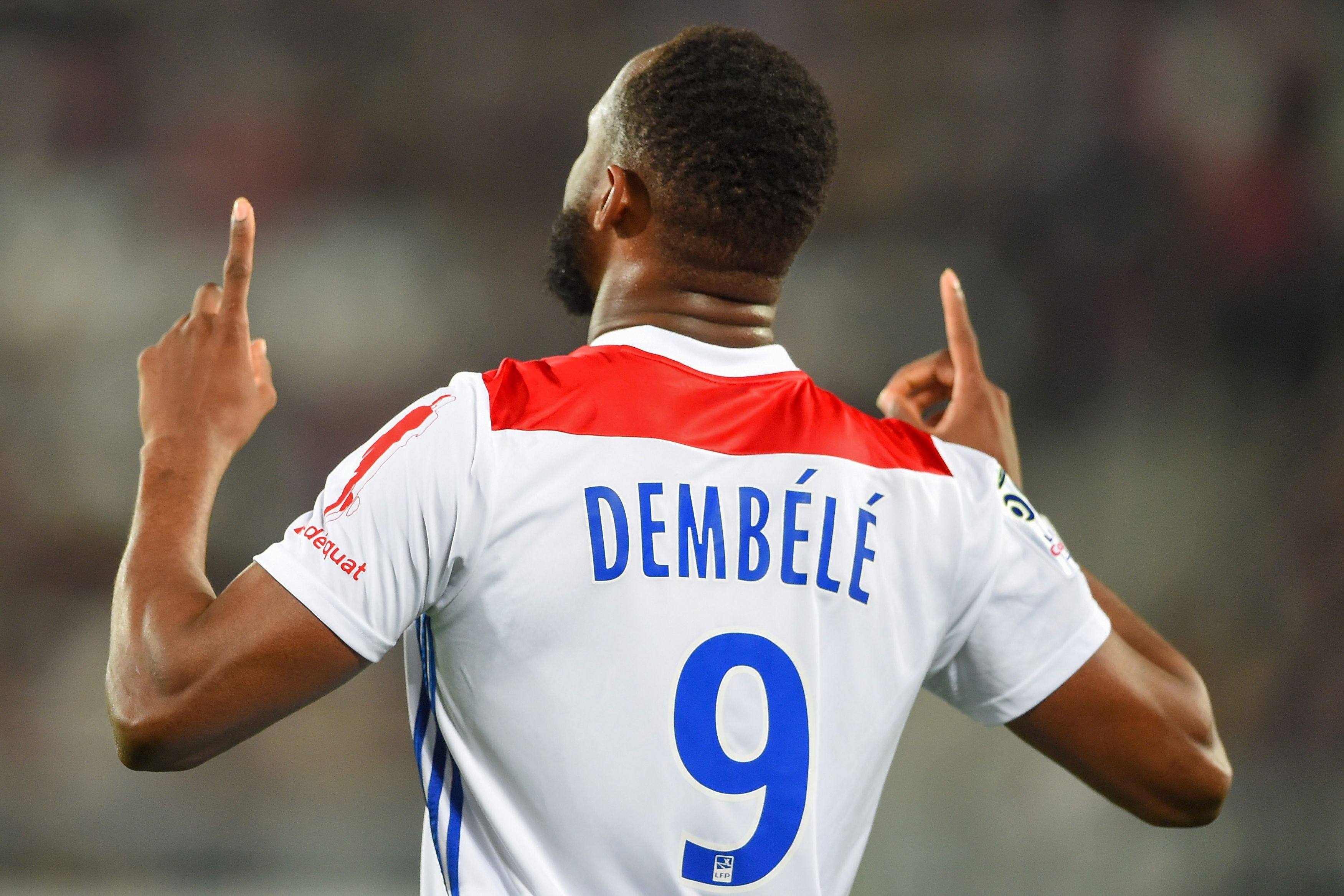 Lyon's French forward Moussa Dembele gestures after scoring a goal during the French L1 football match between Bordeaux (FCGB) and Lyon (OL) on April 26, 2019 at the Matmut Atlantique stadium in Bordeaux, southwestern France. (Photo by NICOLAS TUCAT / AFP) (Photo credit should read NICOLAS TUCAT/AFP/Getty Images)