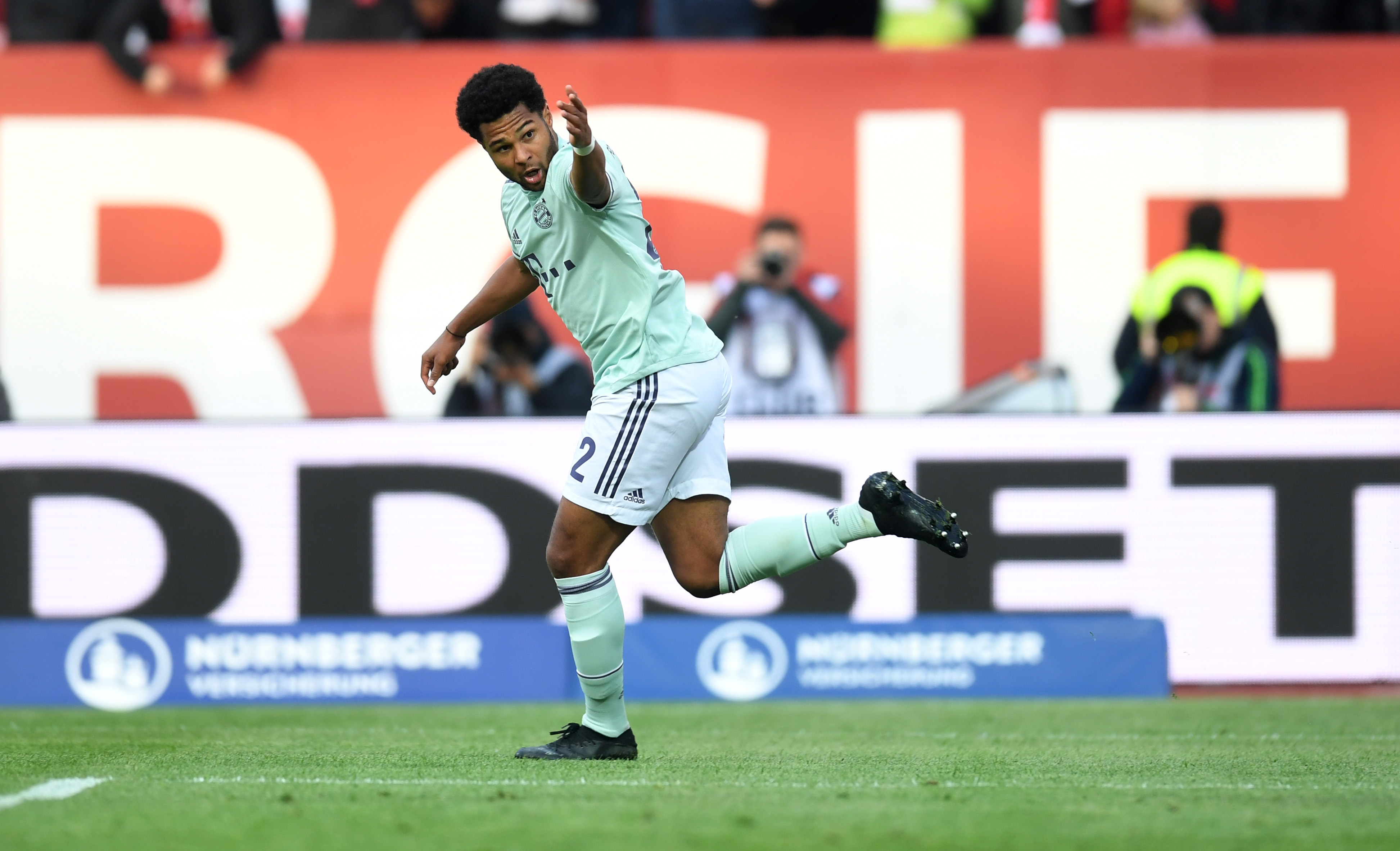 Bayern Munich's German midfielder Serge Gnabry celebrate scoring during the German first division Bundesliga football match Nuremberg v FC Bayern Munich on April 28, 2019 in Nuremberg, southern Germany. (Photo by Christof STACHE / AFP) / RESTRICTIONS: DFL REGULATIONS PROHIBIT ANY USE OF PHOTOGRAPHS AS IMAGE SEQUENCES AND/OR QUASI-VIDEO (Photo credit should read CHRISTOF STACHE/AFP/Getty Images)