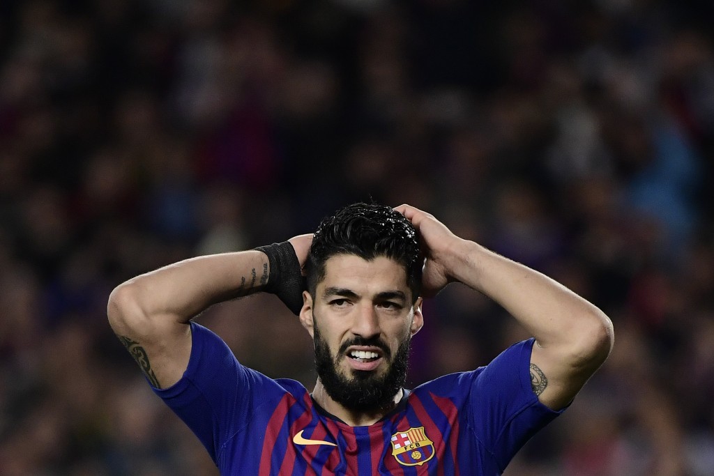 Barcelona's Uruguayan forward Luis Suarez reacts after missing a goal opportunity during the UEFA Champions League semi-final first leg football match between Barcelona and Liverpool at the Camp Nou Stadium in Barcelona on May 1, 2019. (Photo by JAVIER SORIANO / AFP) (Photo credit should read JAVIER SORIANO/AFP/Getty Images)