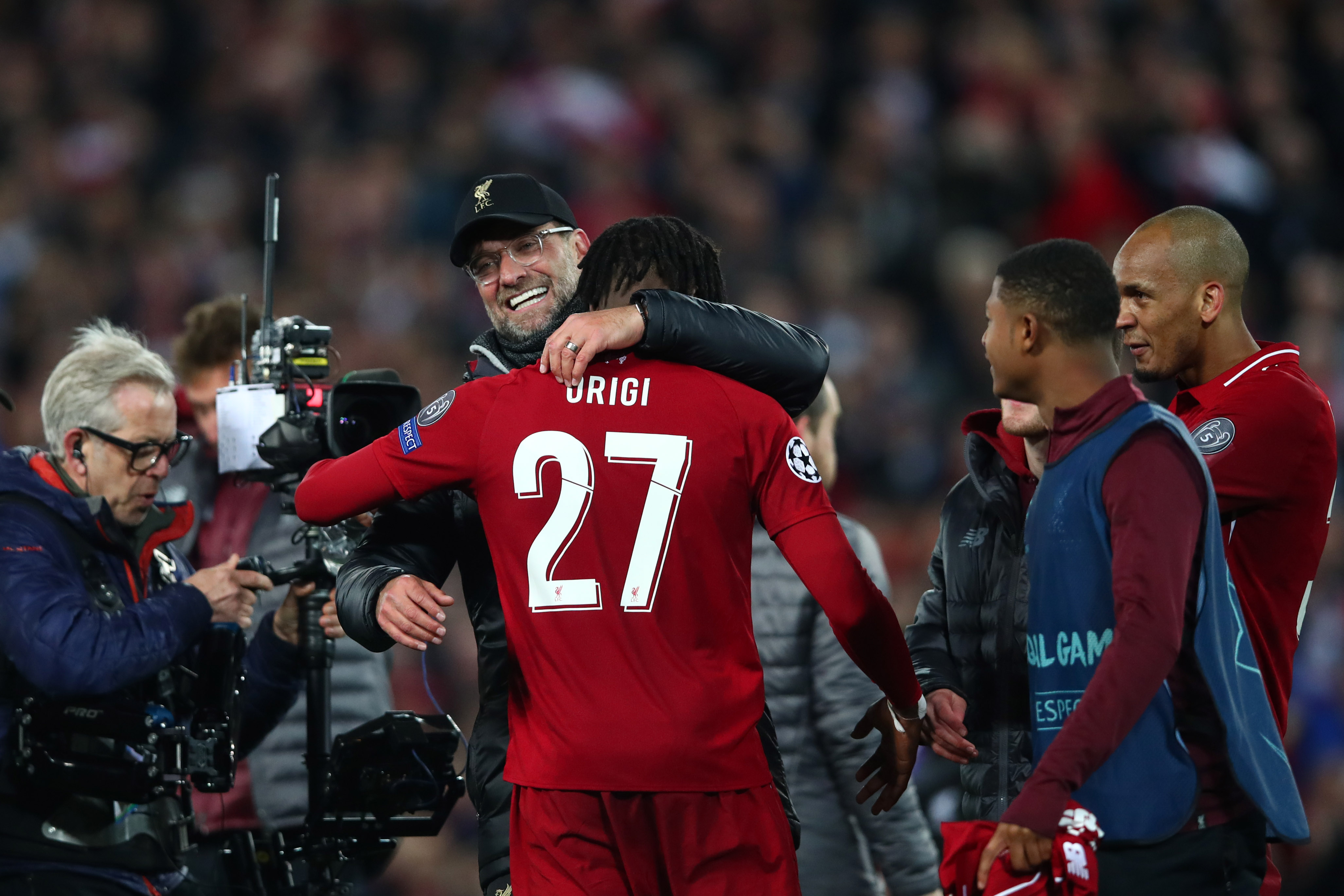LIVERPOOL, ENGLAND - MAY 07: Jurgen Klopp, Manager of Liverpool and Divock Origi celebrate after the UEFA Champions League Semi Final second leg match between Liverpool and Barcelona at Anfield on May 07, 2019 in Liverpool, England. (Photo by Clive Brunskill/Getty Images)