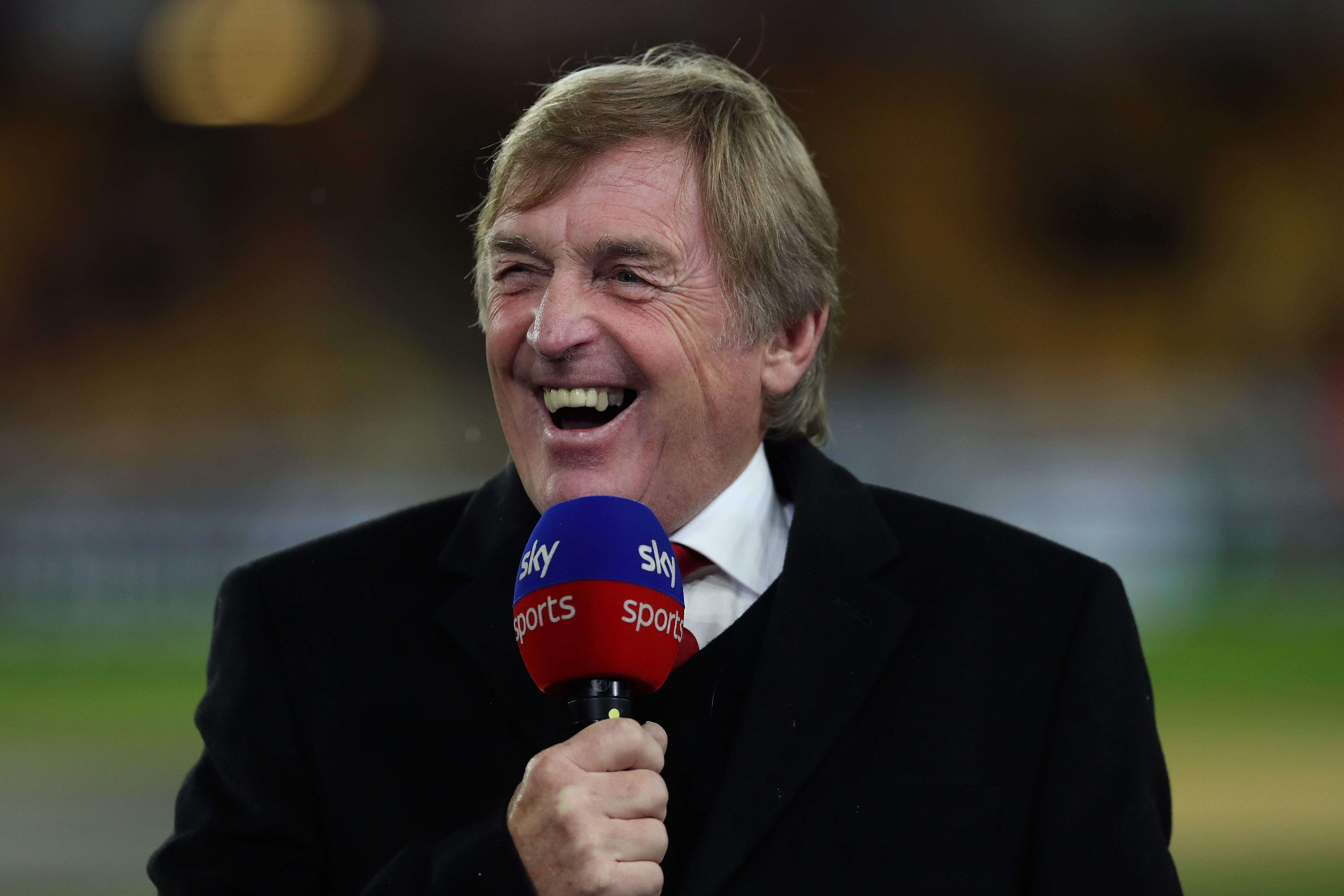 Kenny Dalglish hopes Robertson stays put at Anfield. (Photo courtesy: AFP/Getty)