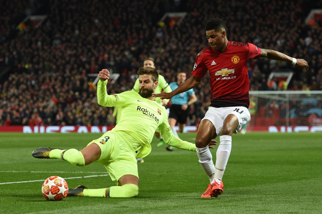 Could Rashford be lining up alongside Gerard Pique soon? (Photo by Oli Scarff/AFP/Getty Images)