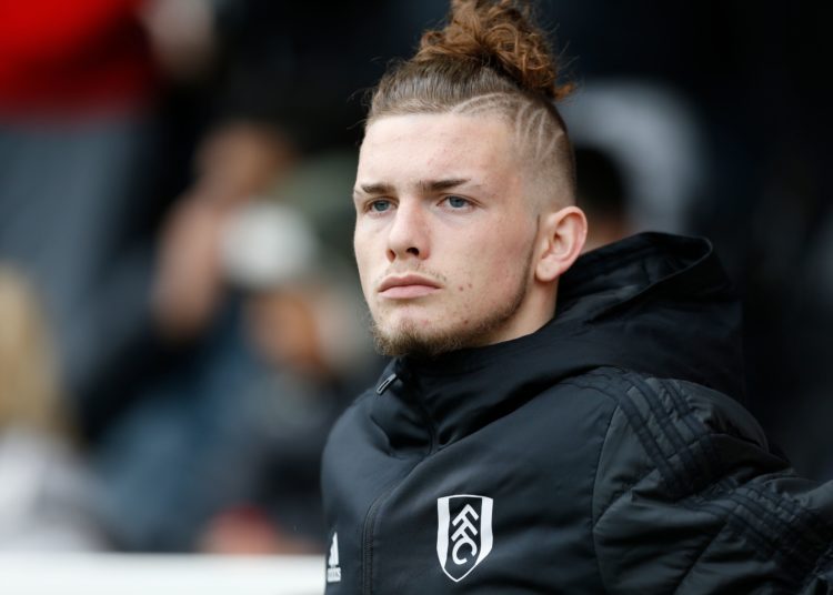 Fulham's 16-year-old player Harvey Elliott takes his place on the bench for the English Premier League football match between Fulham and Cardiff City at Craven Cottage in London on April 27, 2019. (Photo by Ian KINGTON / AFP) / RESTRICTED TO EDITORIAL USE. No use with unauthorized audio, video, data, fixture lists, club/league logos or 'live' services. Online in-match use limited to 120 images. An additional 40 images may be used in extra time. No video emulation. Social media in-match use limited to 120 images. An additional 40 images may be used in extra time. No use in betting publications, games or single club/league/player publications. / (Photo credit should read IAN KINGTON/AFP/Getty Images)