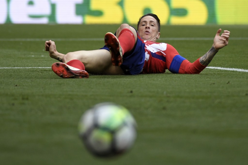Time to step away from the ball. (Picture Courtesy - AFP/Getty Images)