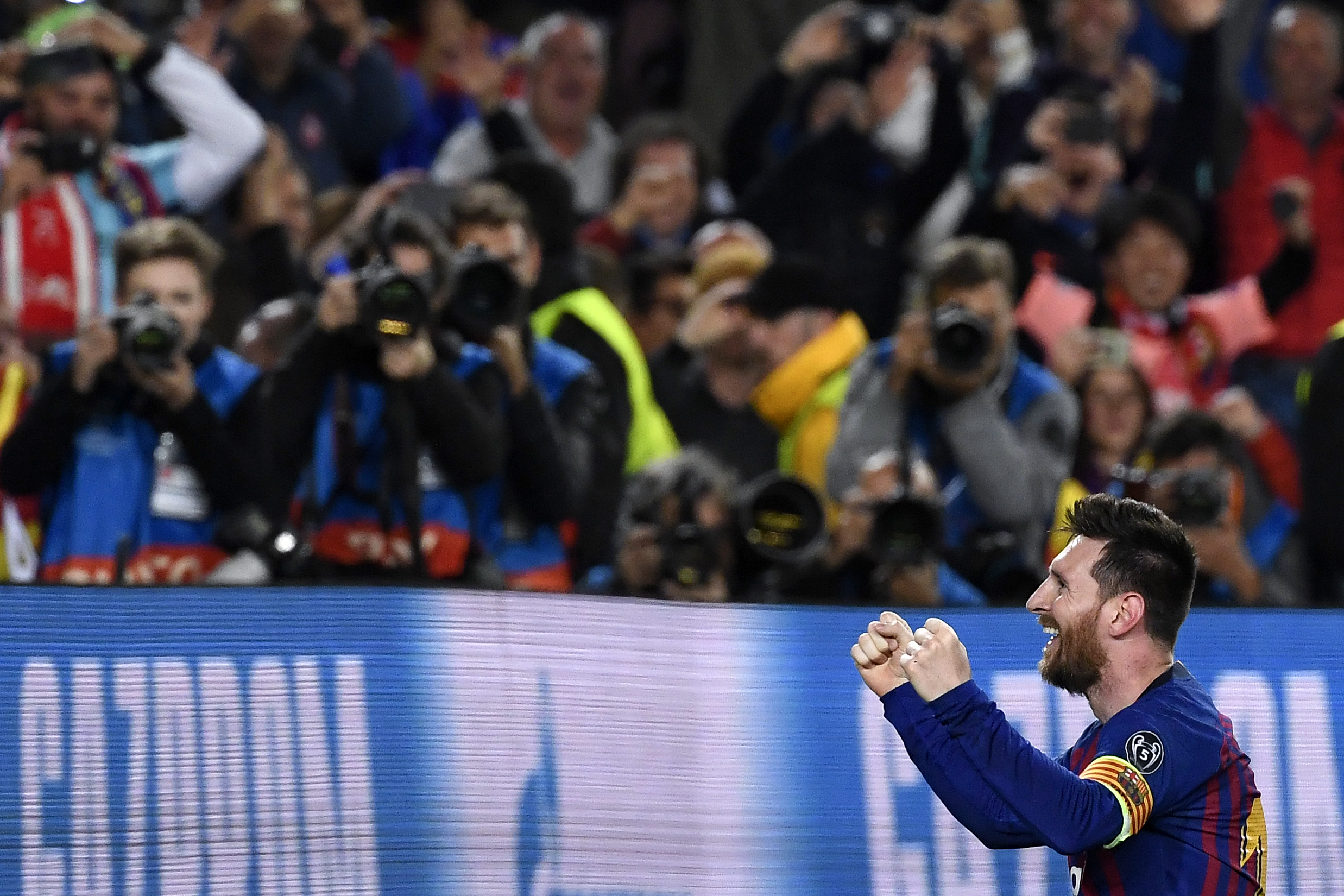 Barcelona's Argentinian forward Lionel Messi celebrates after scoring his team's third goal during the UEFA Champions League semi-final first leg football match between Barcelona and Liverpool at the Camp Nou Stadium in Barcelona on May 1, 2019. (Photo by LLUIS GENE / AFP) (Photo credit should read LLUIS GENE/AFP/Getty Images)