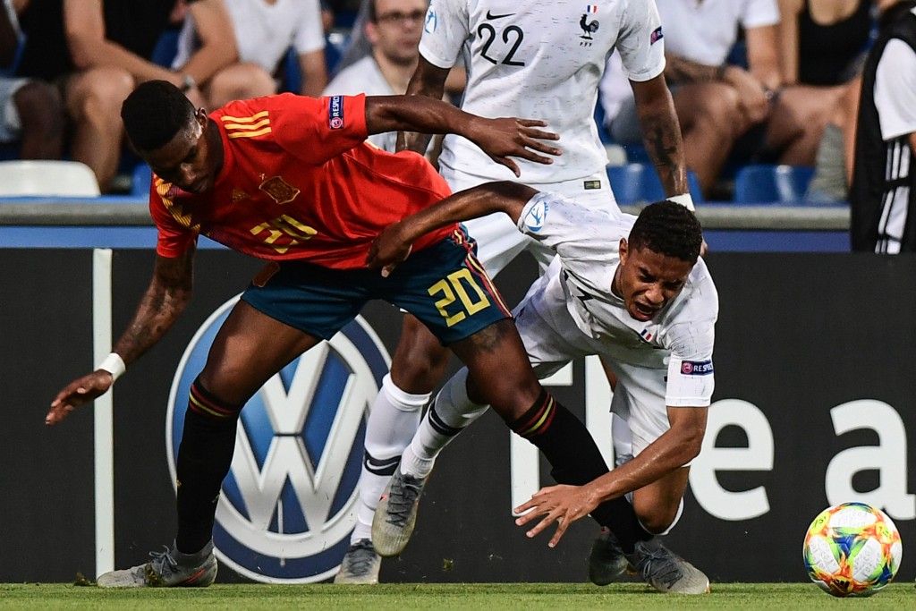 The future of Junior Firpo (L) hangs in the balance. (Photo by Migues Medina/AFP/Getty Images)