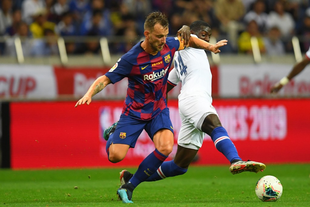 Rakitic going nowhere (Photo by Atsushi Tomura/Getty Images)