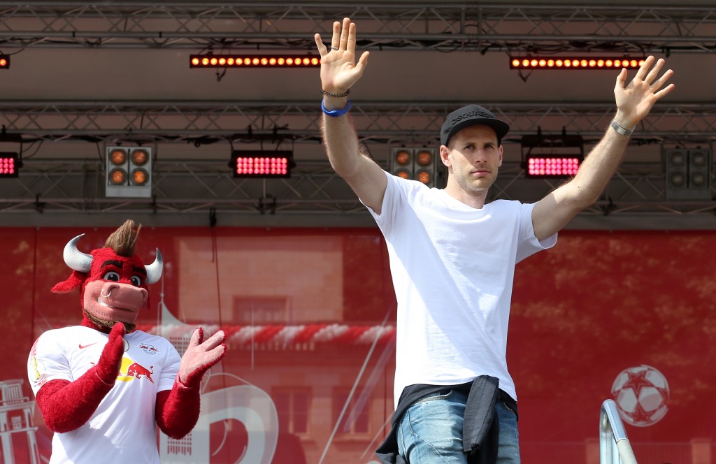 LEIPZIG, GERMANY - MAY 26: Peter Gulacsi of Leipzig celebrates with fans during the RB Leipzig Fanfest at Festwiese on May 26, 2019 in Leipzig, Germany. (Photo by Matthias Kern/Bongarts/Getty Images)