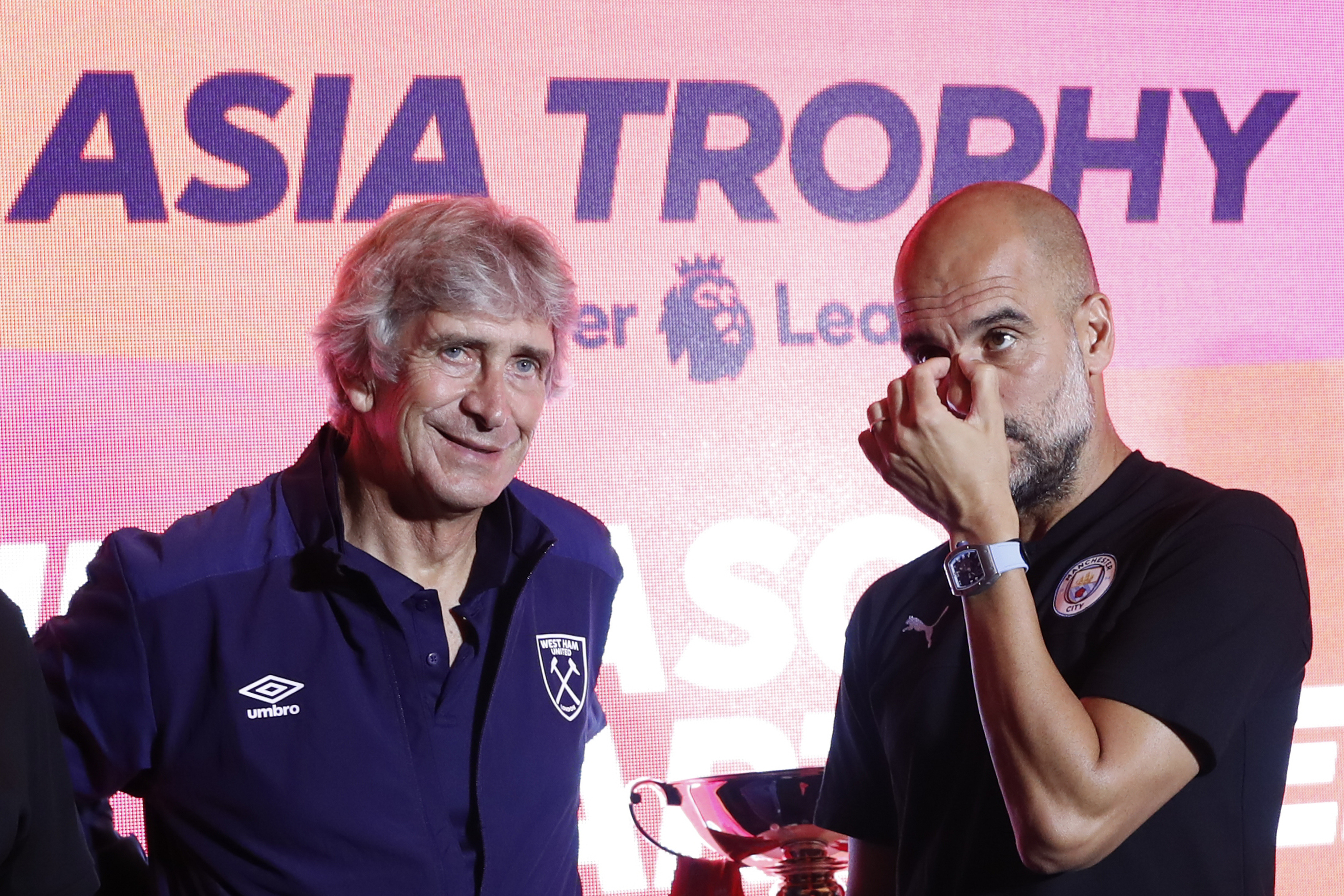 SHANGHAI, CHINA - JULY 19:  (L-R)  Head coach Manuel Pellegrini of West Ham United, Manager of Manchester City FC Pep Guardiola  attends cocktail reception to celebrate the Premier League Asia Trophy, the youth tournament and showcase the wider football development work in China, during the Premier League Asia Trophy on July 19, 2019 in Shanghai, China.  ((Photo by Fred Lee/Getty Images for Premier League)