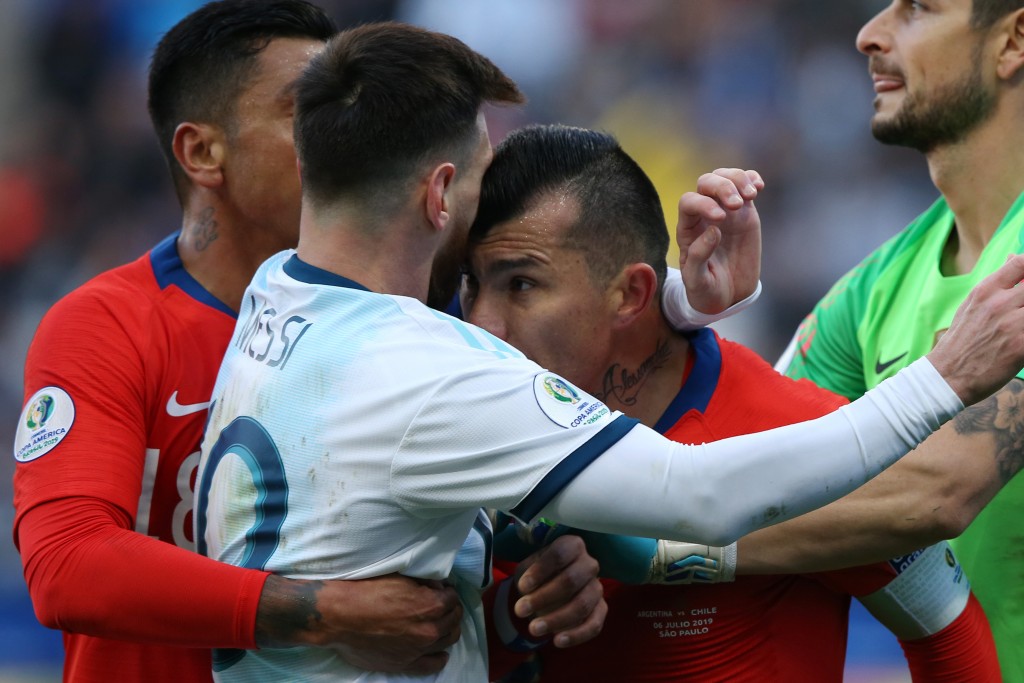 Messi and Medel were both sent-off for this altercation in the Third-Placed Playoff at Copa America 2019. (Picture Courtesy - AFP/Getty Images)