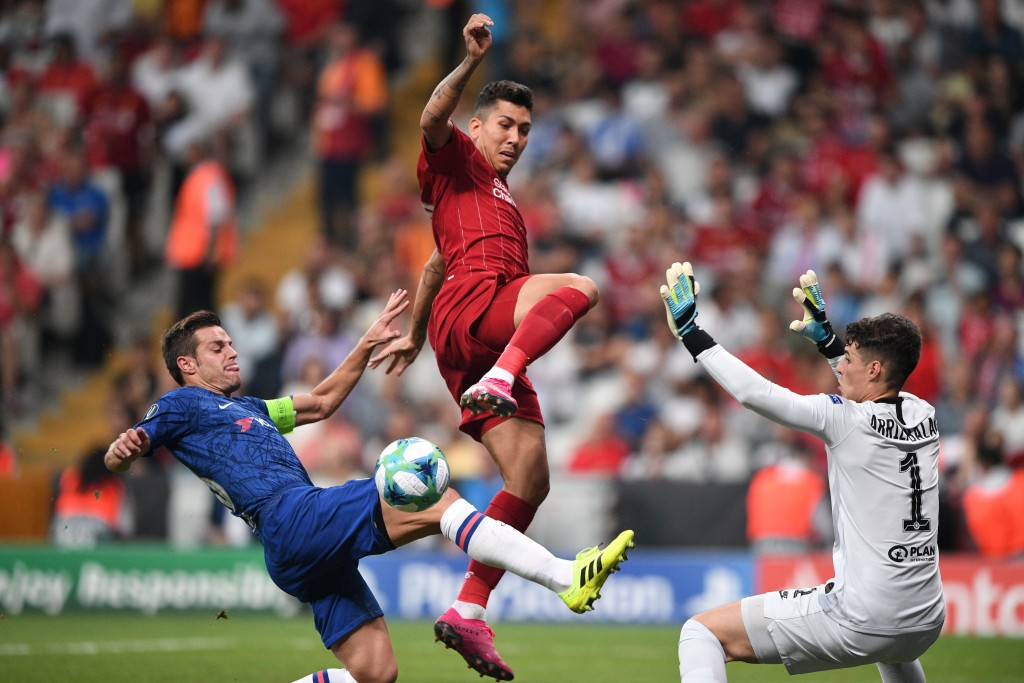 Kepa caught in two minds leading to Liverpool equalizer (Photo by BULENT KILIC/AFP/Getty Images)