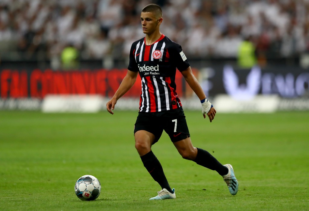 FRANKFURT AM MAIN, GERMANY - AUGUST 01: Dejan Joveljic of Frankfurt runs with the ball during the UEFA Europa League Second Qualifying Round 2nd Leg match between Eintracht Frankfurt and FC Flora Tallinn at Commerzbank-Arena on August 01, 2019 in Frankfurt am Main, Germany. (Photo by Martin Rose/Bongarts/Getty Images)