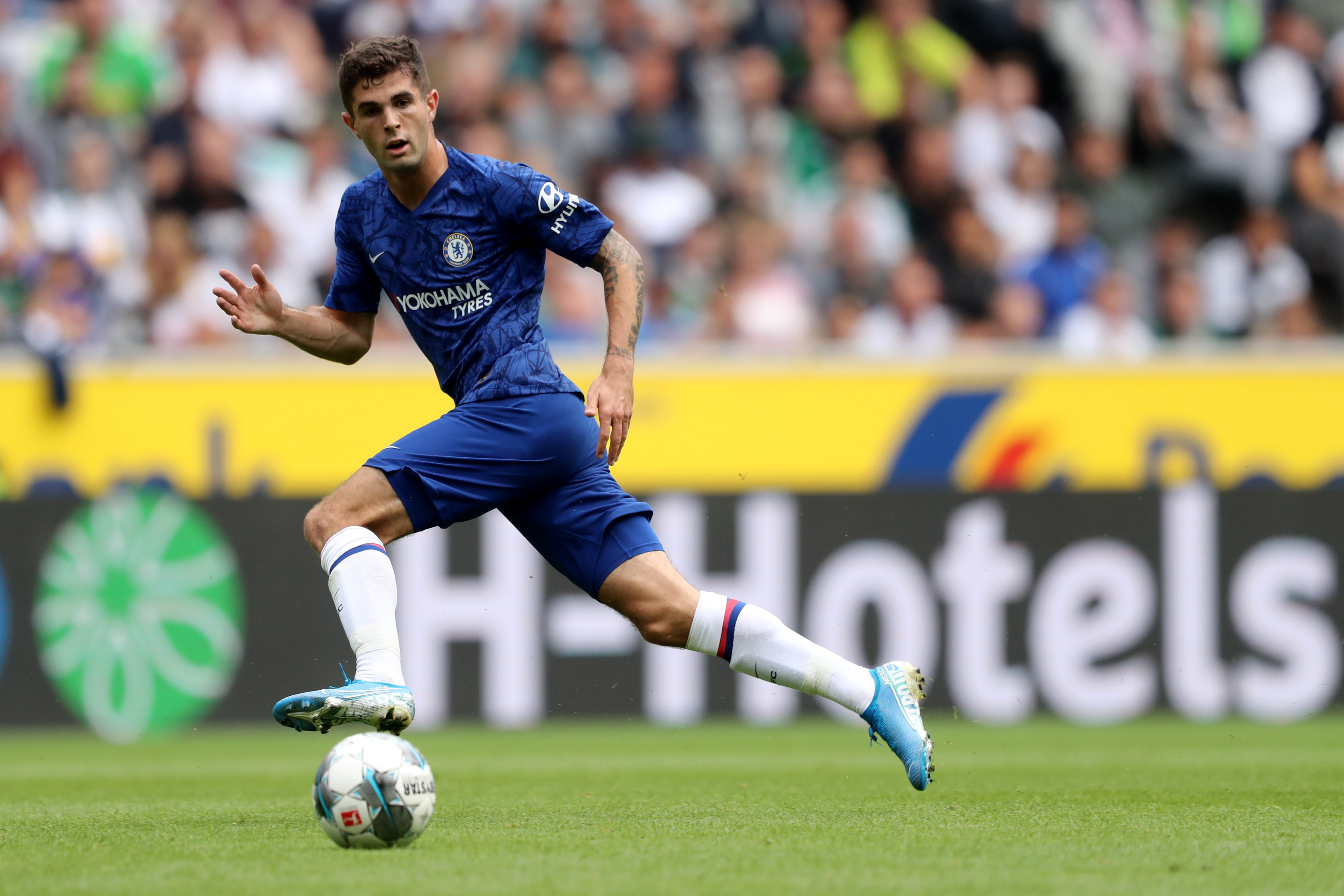 MOENCHENGLADBACH, GERMANY - AUGUST 03: Christian Pulisic of Chelsea runs with the ball during the pre-season friendly match between Borussia Moenchengladbach and FC Chelsea at Borussia-Park on August 03, 2019 in Moenchengladbach, Germany. The match between Moenchengladbach and Chelsea ended 2-2. (Photo by Christof Koepsel/Bongarts/Getty Images)