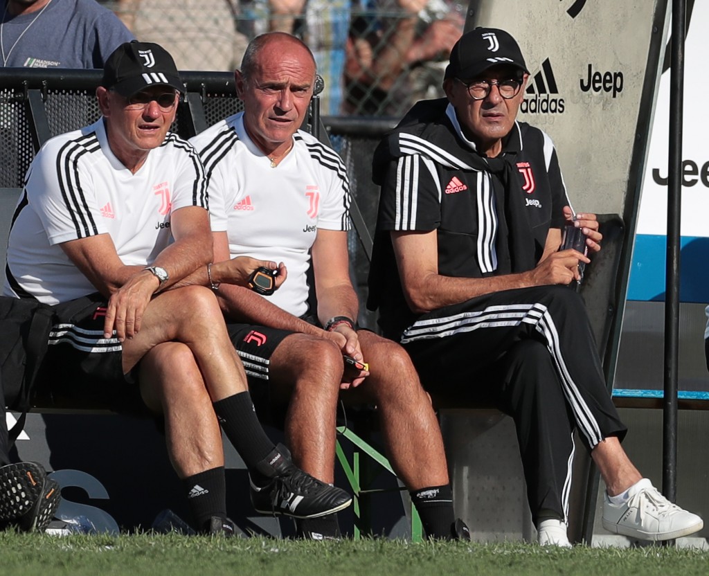 TURIN, ITALY - AUGUST 14: Juventus coach Maurizio Sarri (R) looks on during the Pre-season Friendly match betewwen Juventus A v Juventus B on August 14, 2019 in Villar Perosa near Turin, Italy. (Photo by Emilio Andreoli/Getty Images)